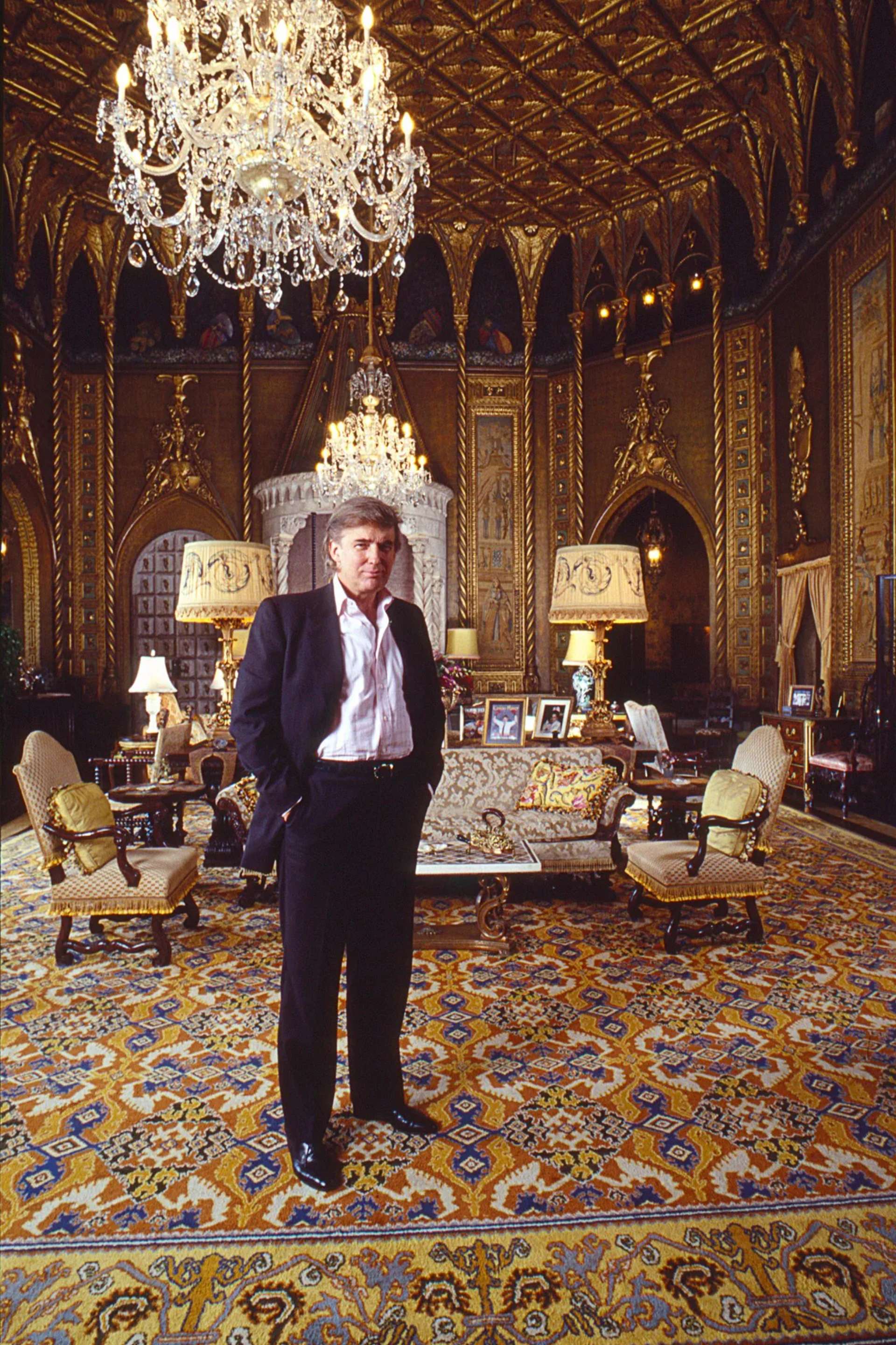 Former U.S. President Donald Trump standing in his golden living room at his residence Mar-A-Lago, Florida.