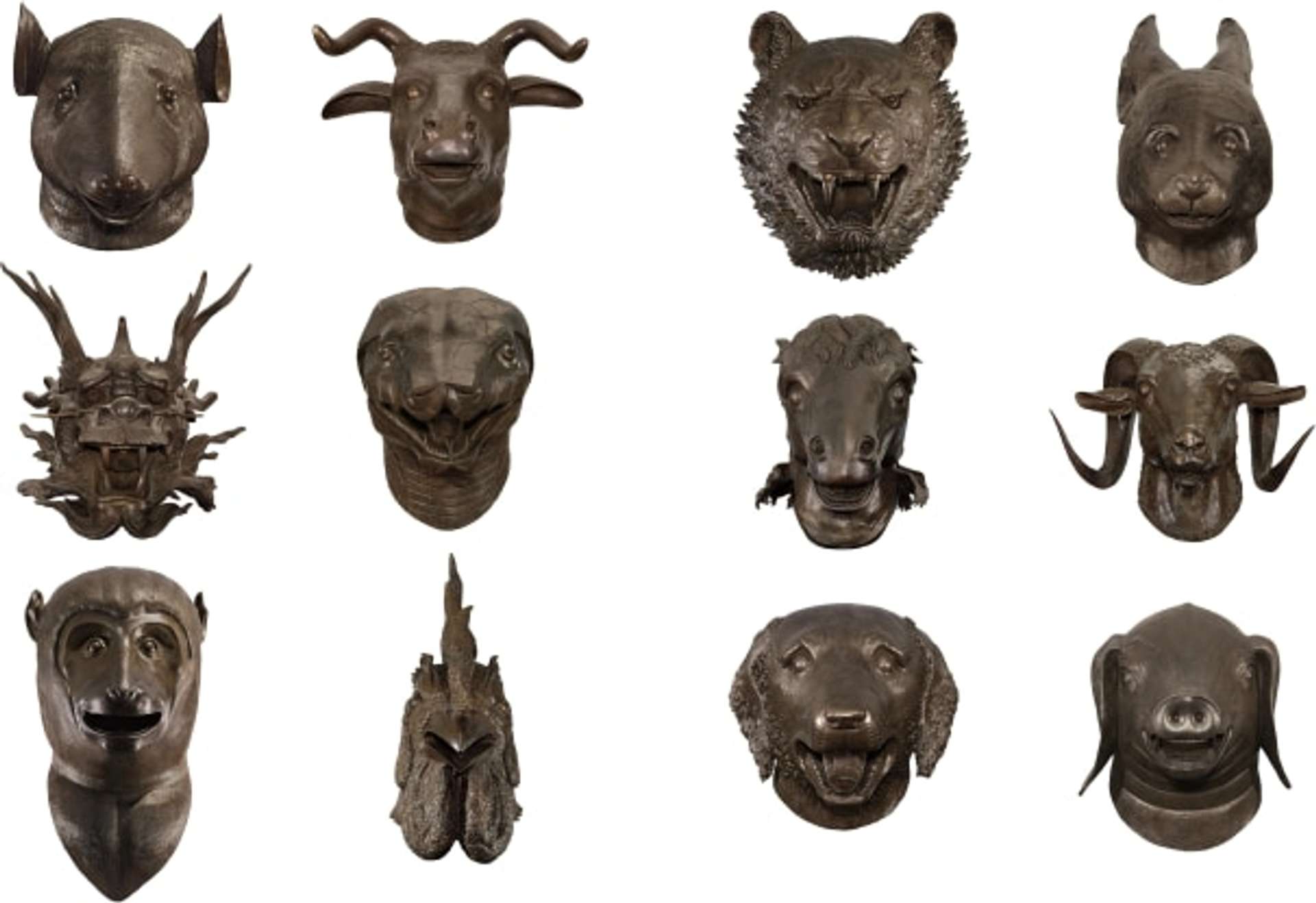  A photograph of twelve bronze sculpted heads arranged in three rows, with four animals in each row. The sculptures represent the figures of the Chinese zodiac. From the top left corner, the animals are: rat, ox, tiger, rabbit, dragon, snake, horse, goat, monkey, rooster, dog, and pig.