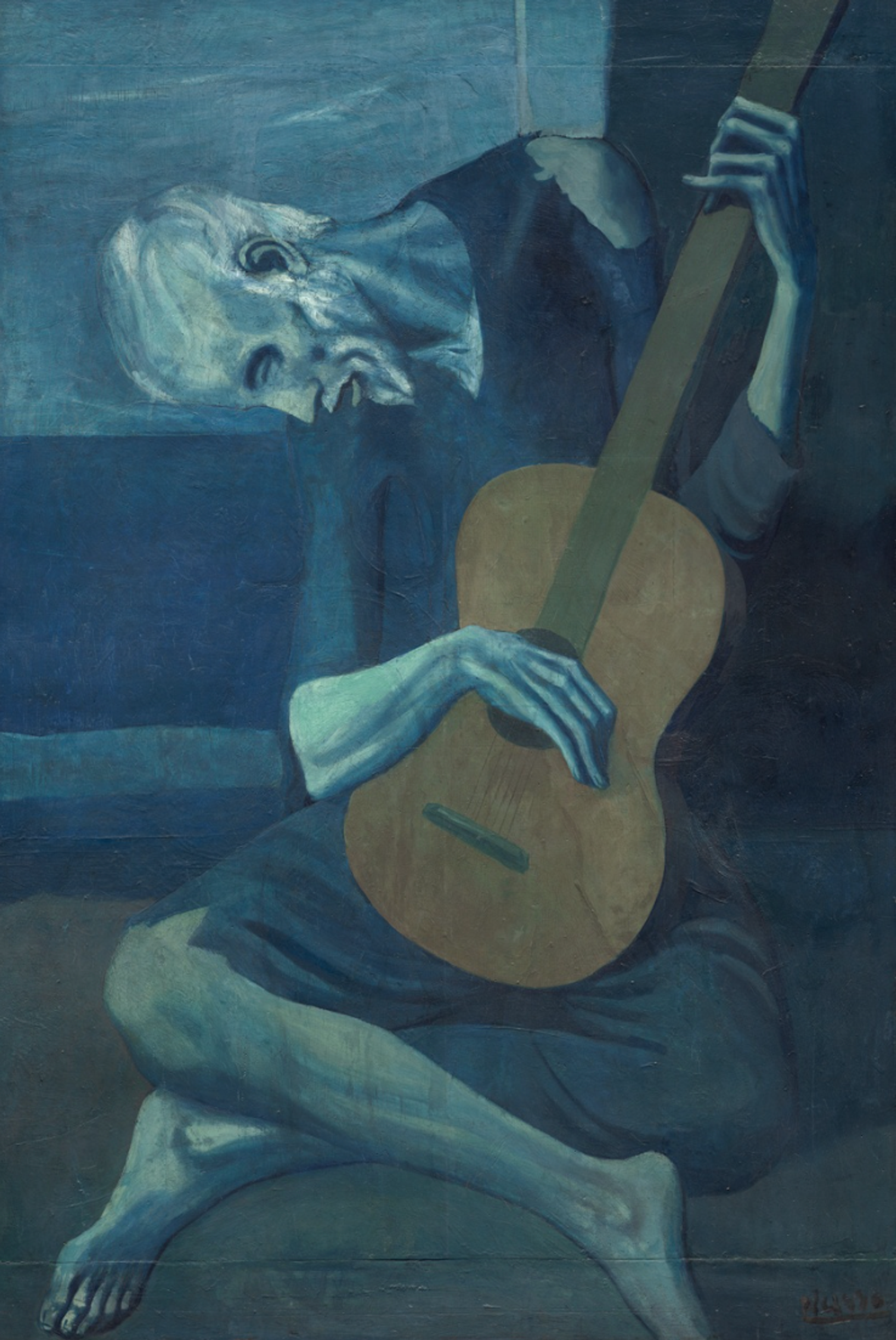 Painting by Pablo Picasso, depicting a seated guitarist with his head emotionally tilted down. The colour palette is limited, in varying shades of blue. 