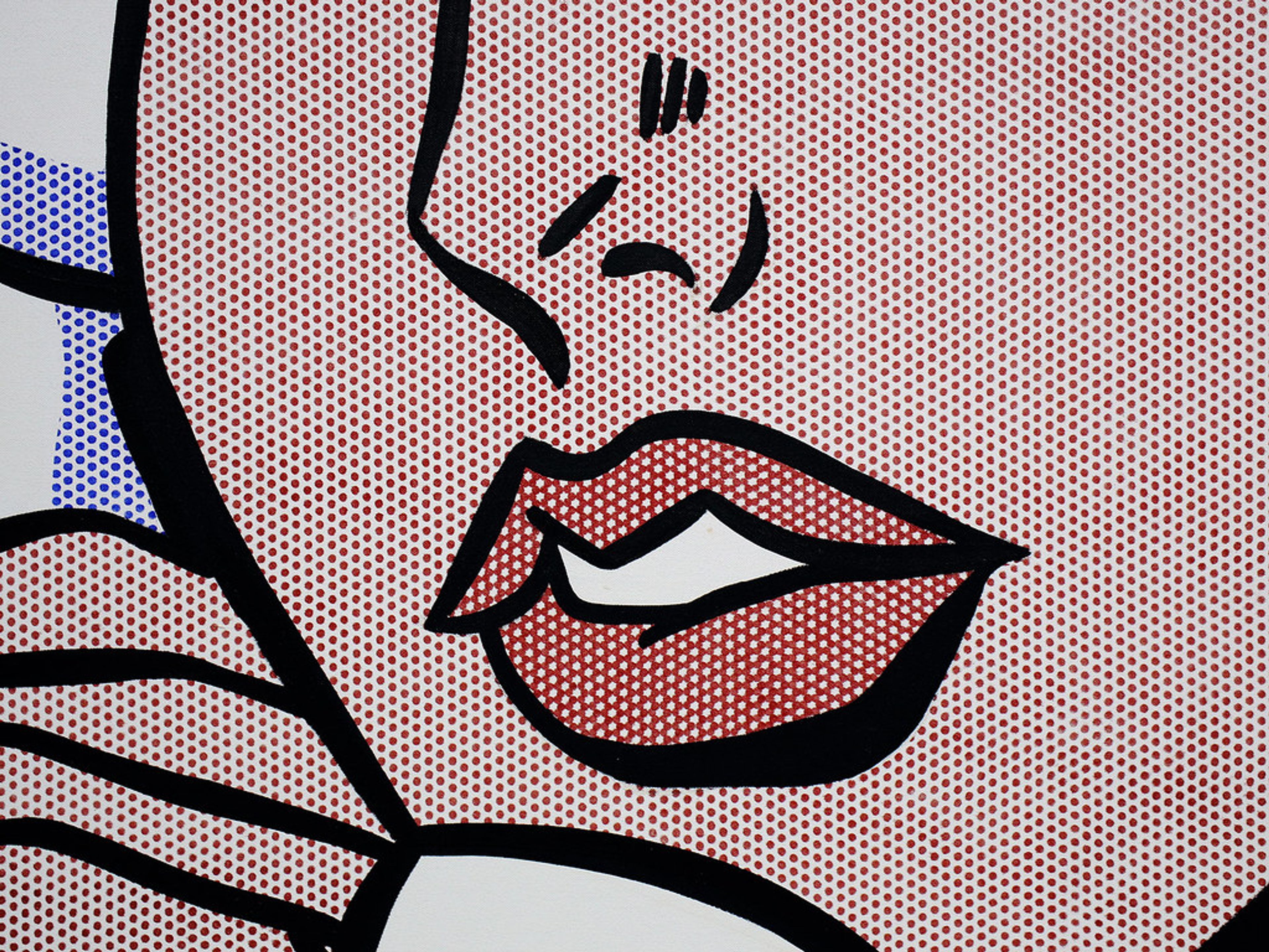 This picture shows an extreme closeup of one of Lichtenstein's paintings. It shows the irregular red and white Ben-Day dots and a pair of boldly outlined woman's lips.