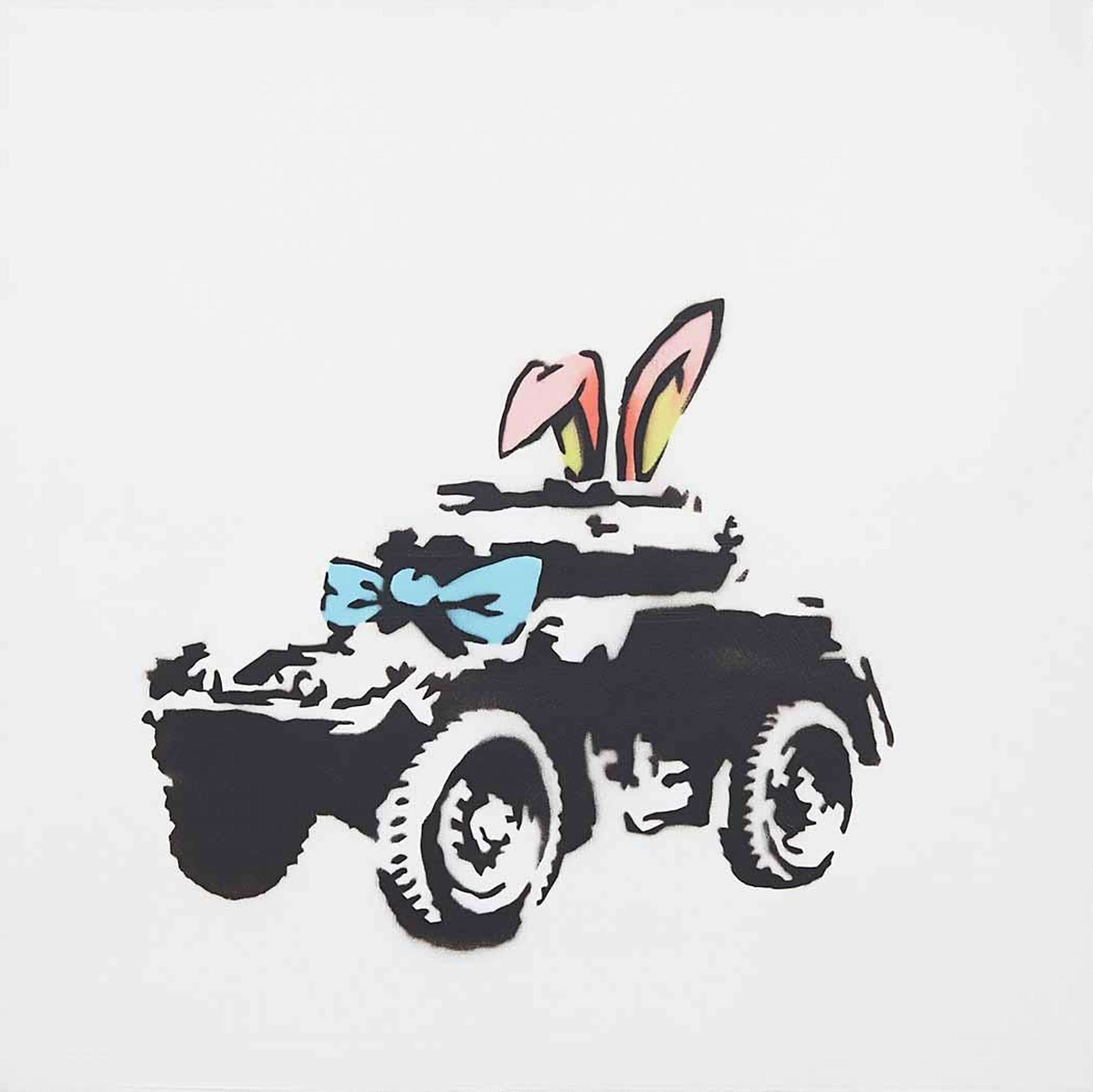 Banksy’s Armoured Car. A spray paint and acrylic work of an army tank with animated bunny ears and a bow on it. 