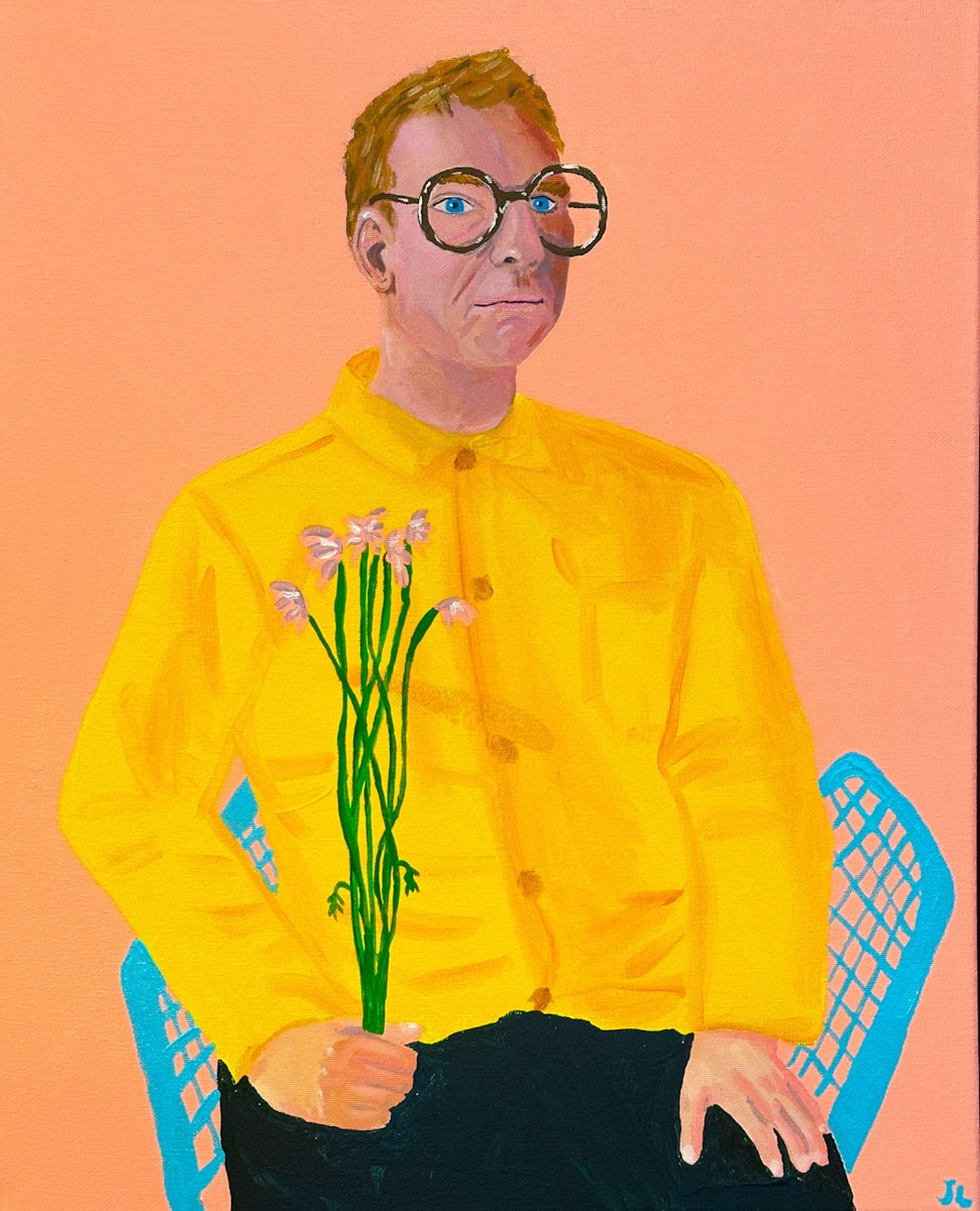 A portrait of a man wearing a bright yellow jacket, holding a bunch of tall pink flowers, sat on a blue chair against a peach background.