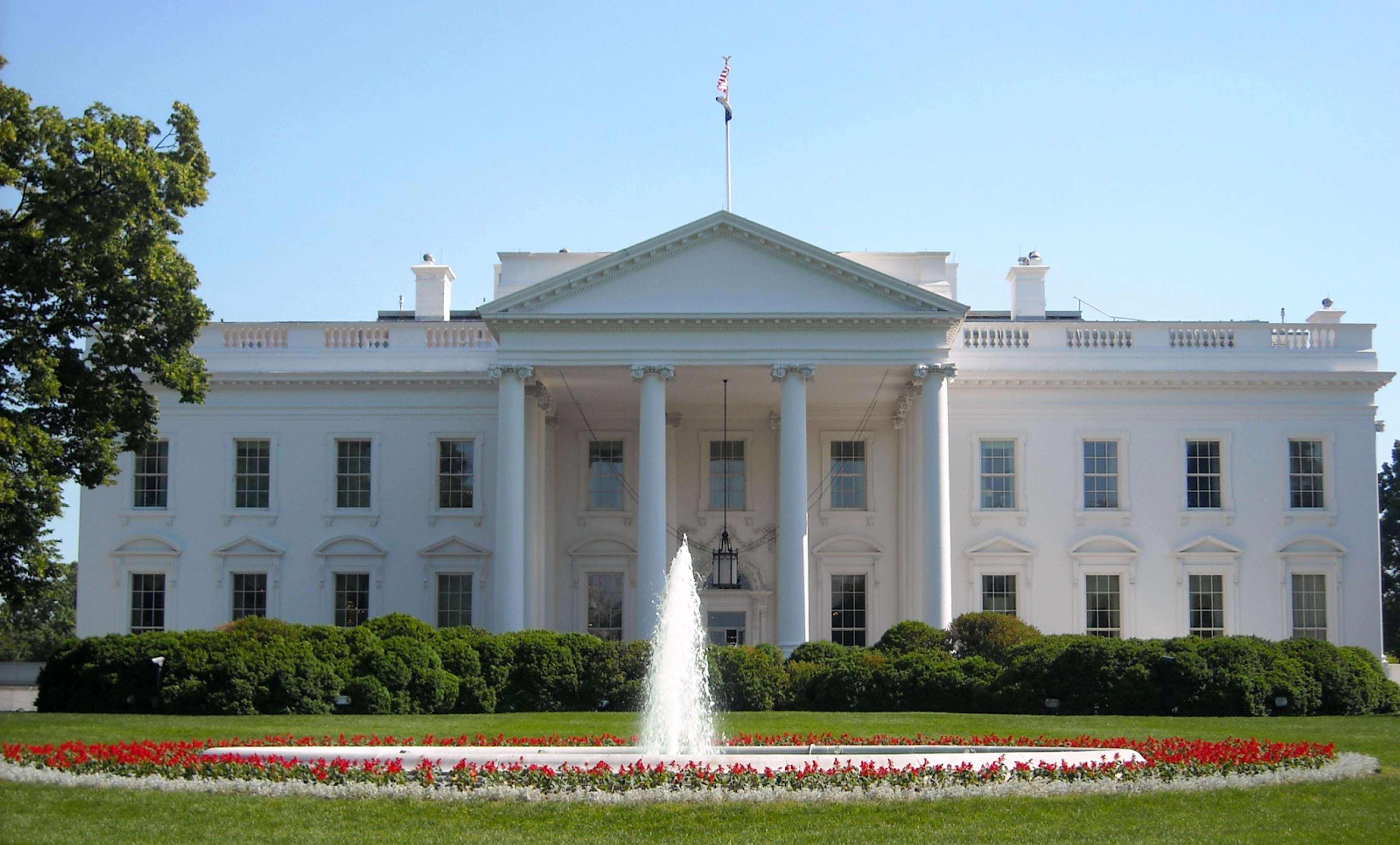 A photograph of the front of the White House.