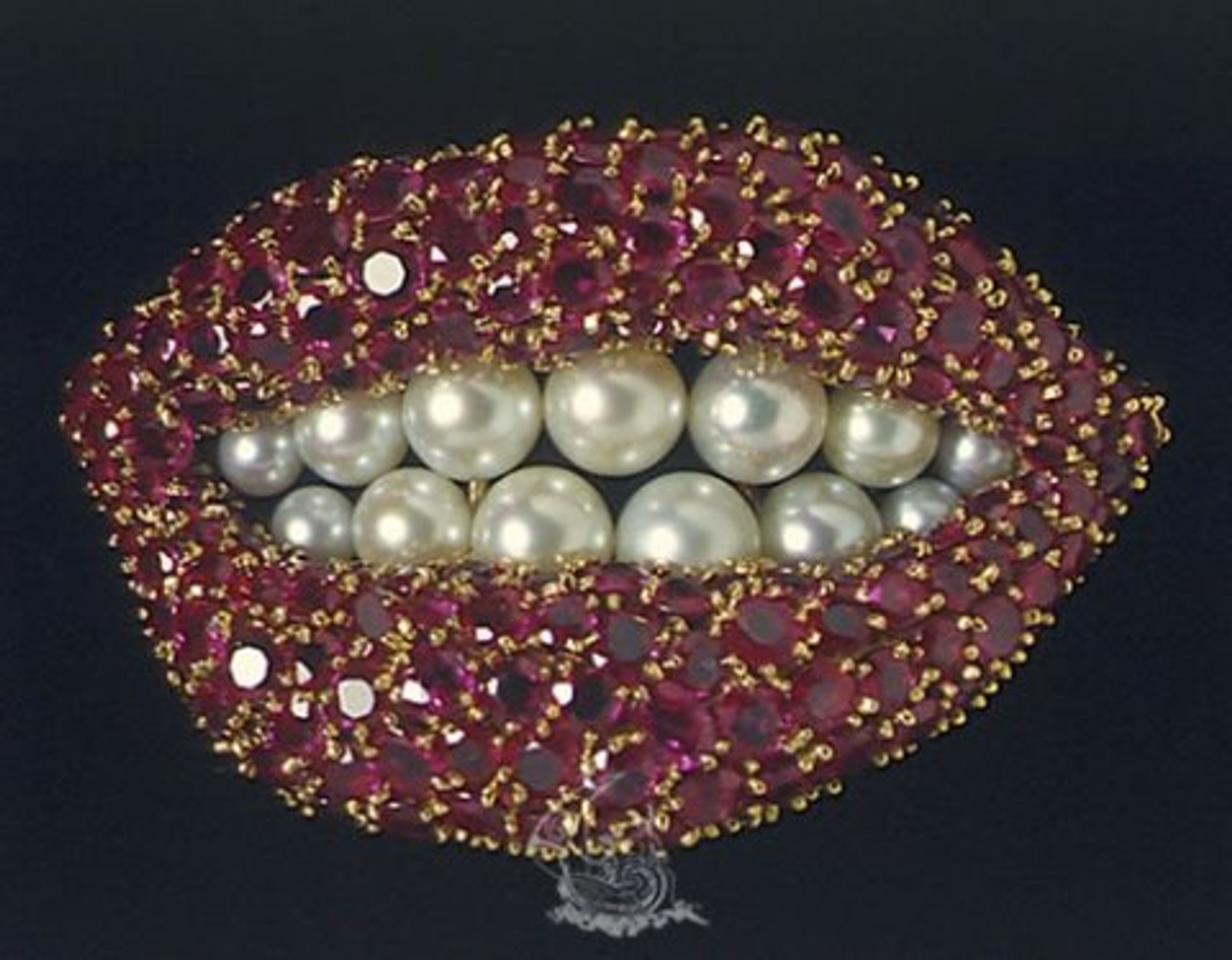Salvador Dalí’s Ruby Lips. Rubies in the shape of a mouth with pearls as teeth.