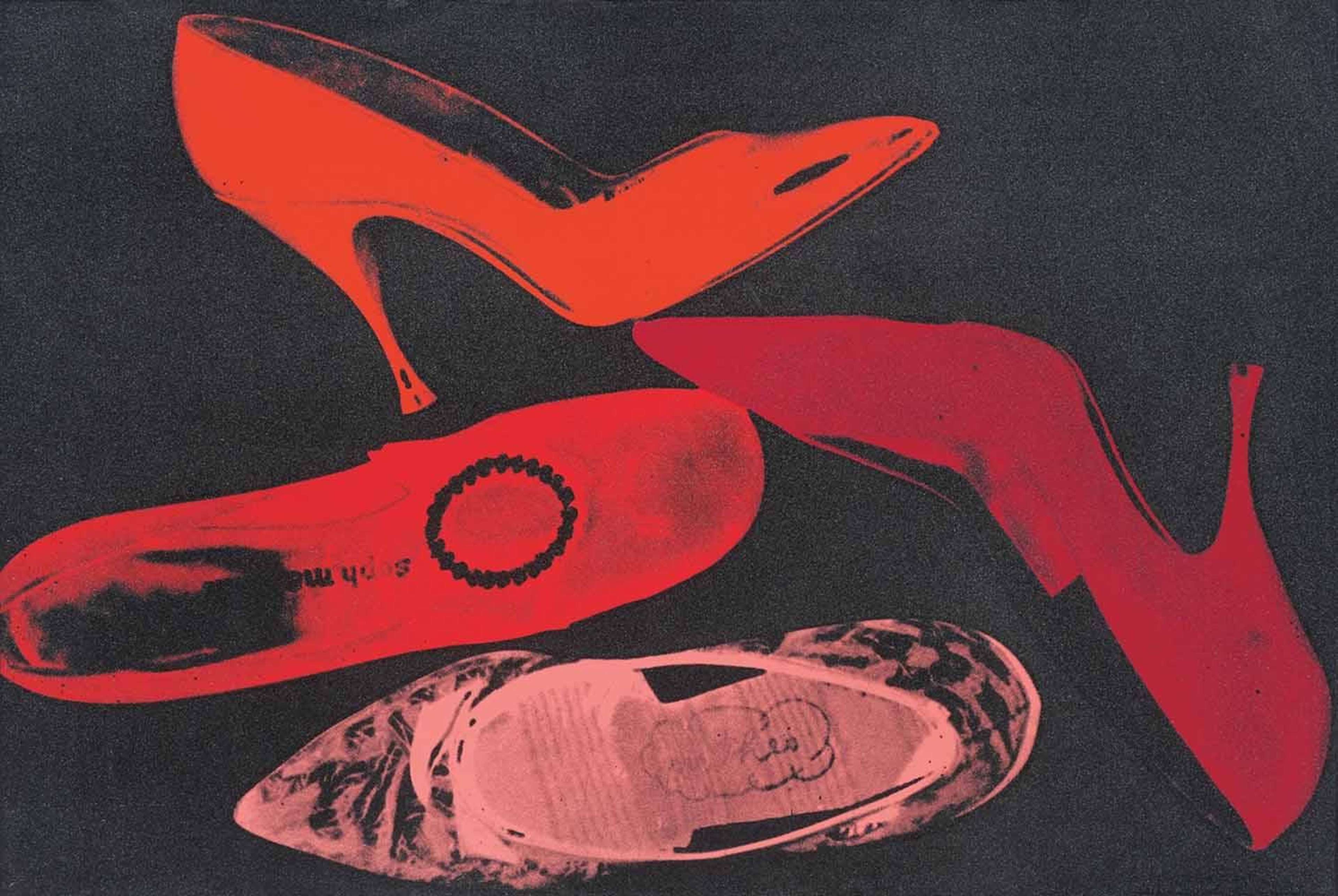 The print depicts four shoes arranged haphazardly, as if they had been dropped carelessly onto the floor. The shoes are rendered against a black backdrop in a variety of warm colours with orange, red and coral dominating the composition. The bright colours contrast with the dark, plain background, drawing attention towards the random arrangement of shoes.