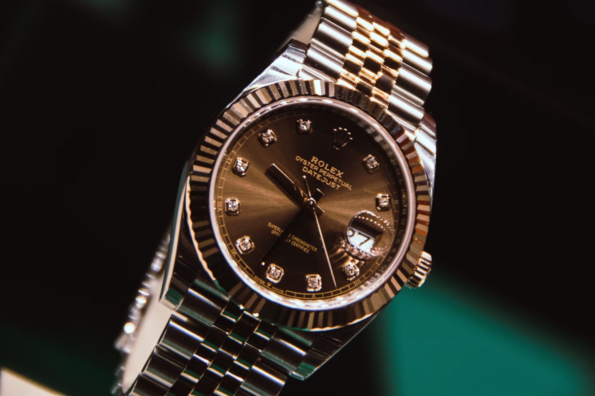 Close up of a gold Rolex watch