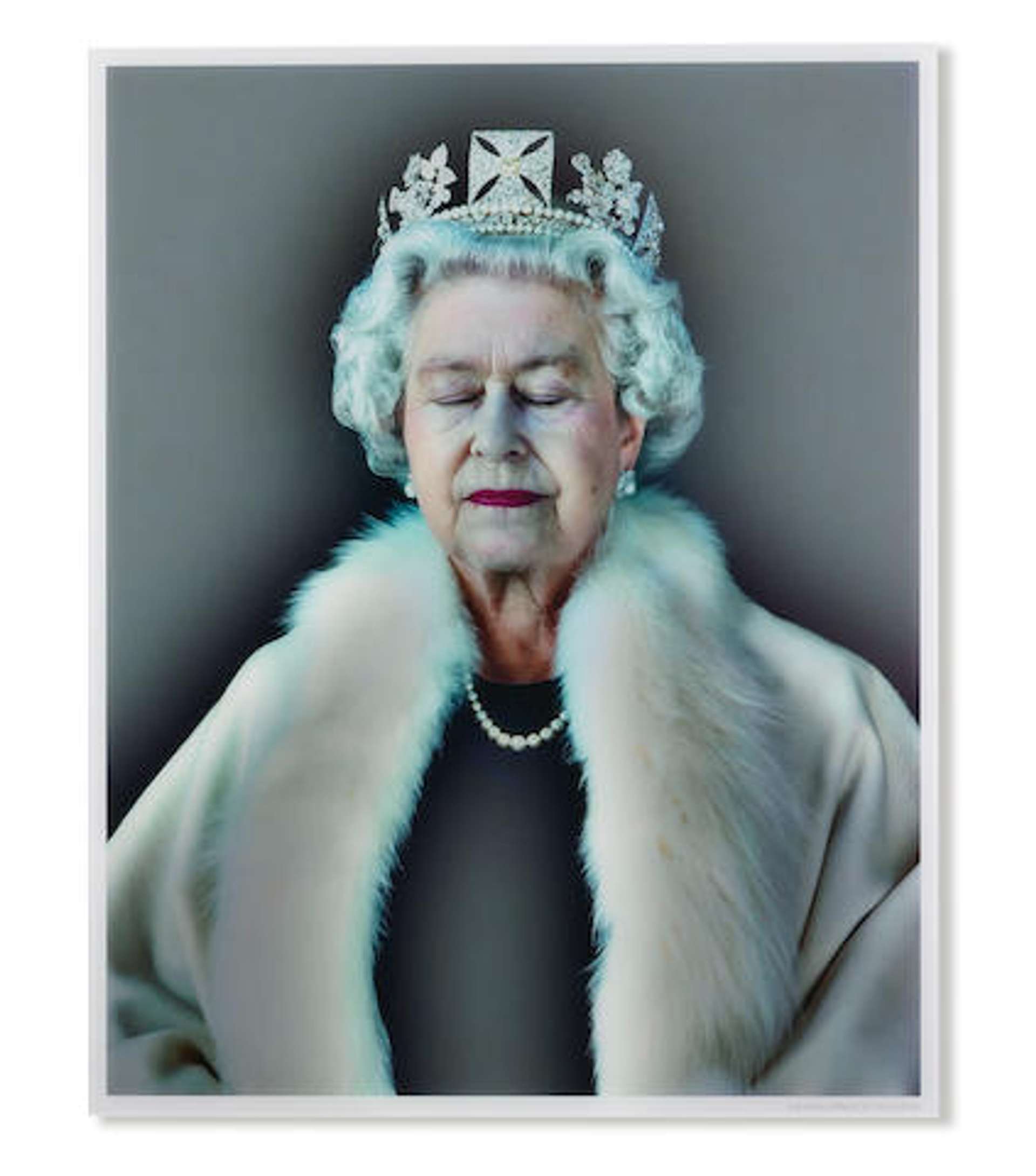 A lightbox portrait Queen Elizabeth II. She has her eyes closed and wears a fur-lined robe with a crown on her head.