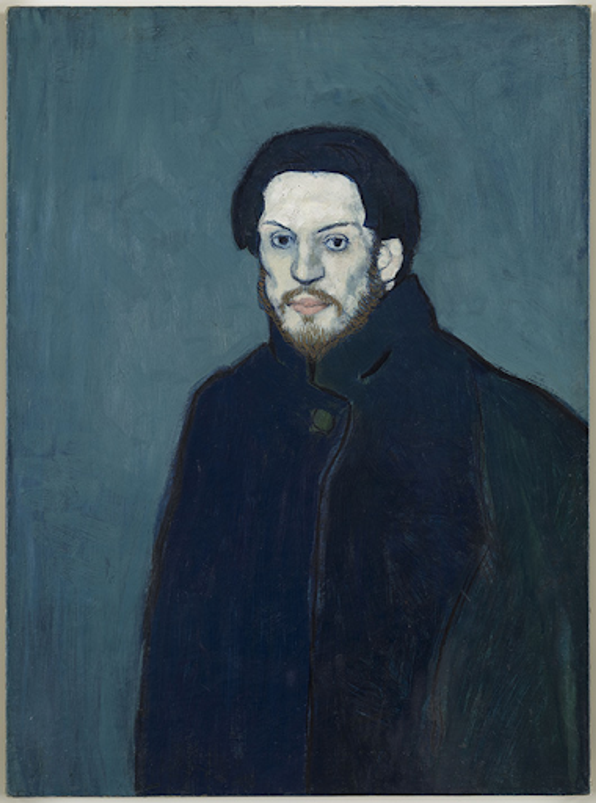 Pablo Picasso’s Autoportrait. A Blue Period painting of a man’s portrait who is dressed in blue, against a blue background with a blue hue to his face. 