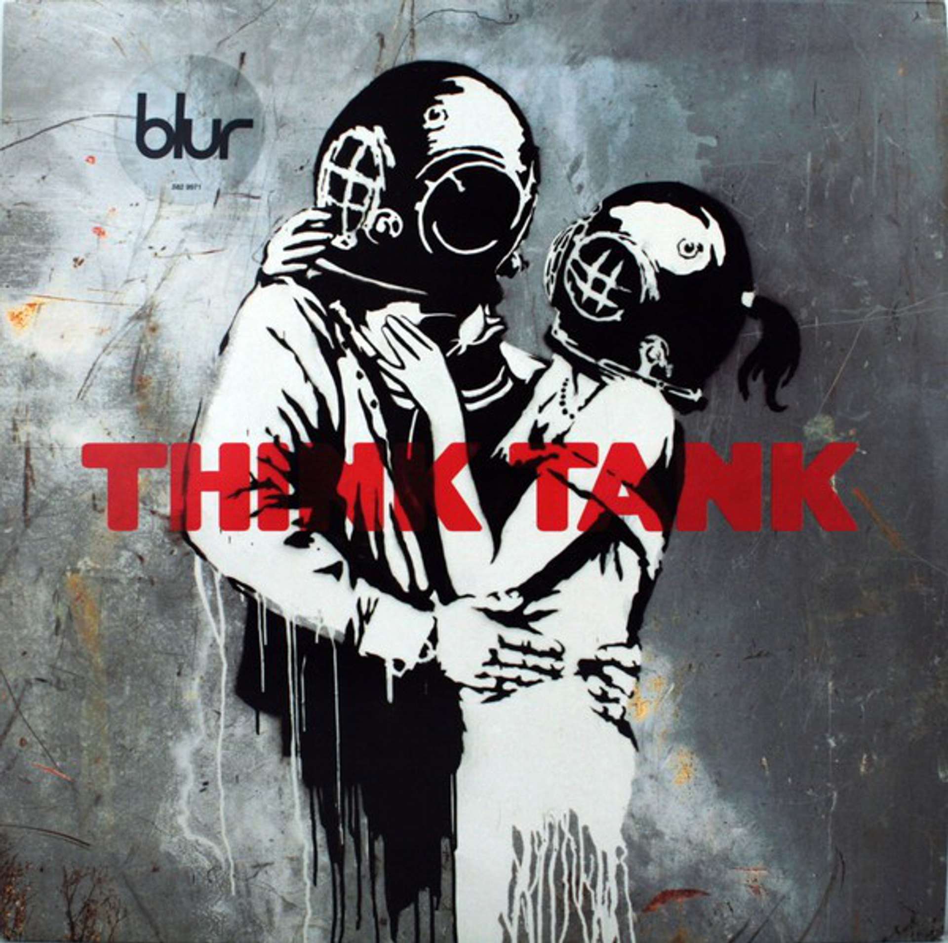 An image of the album cover for Think Tank, done by artist Banksy. It depicts a black-and-white stencil of a couple embracing whilst wearing deep sea diving helmets.