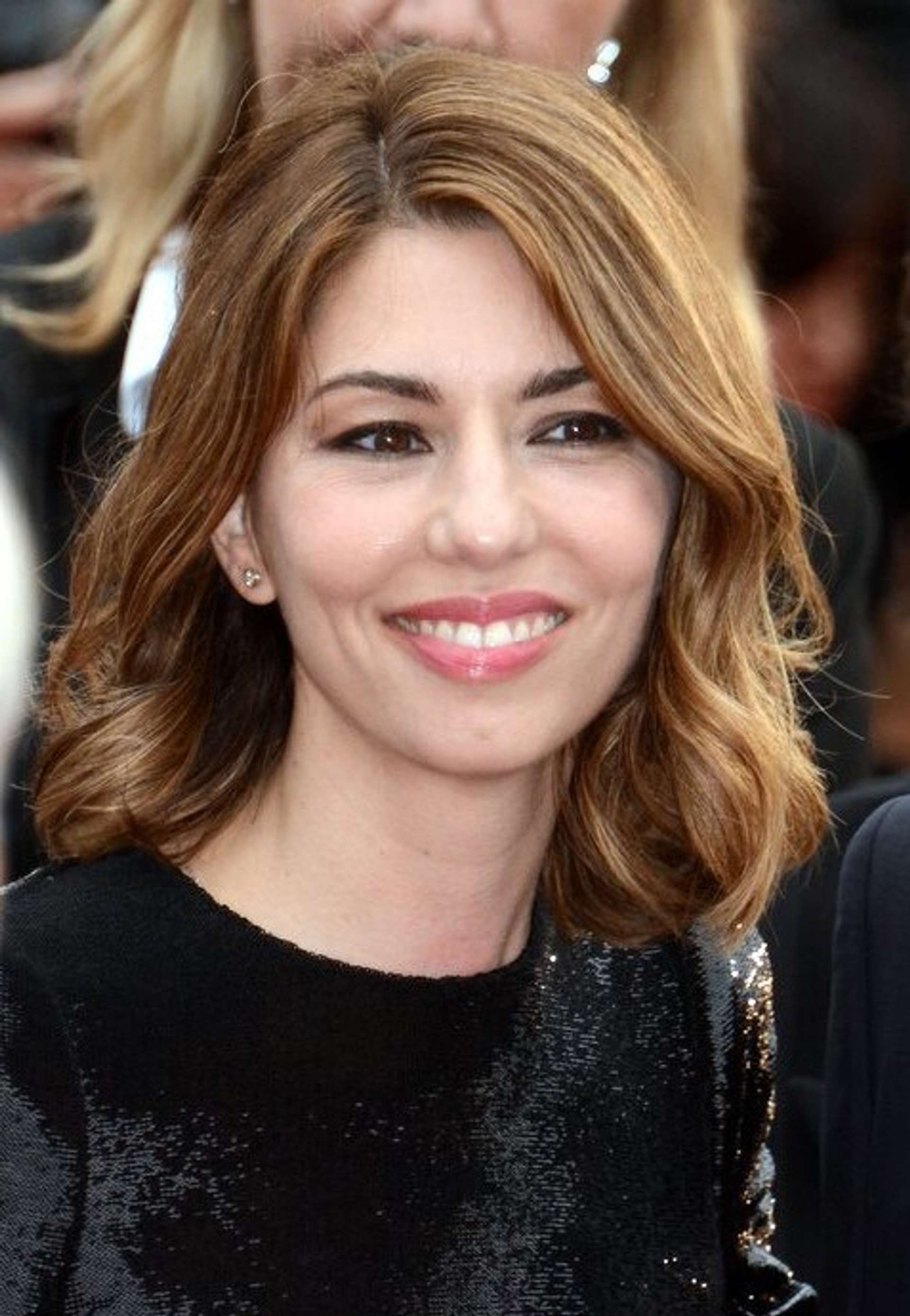 Portrait photograph of American filmmaker and actress Sofia Coppola, at the Cannes Film Festival, 2013.