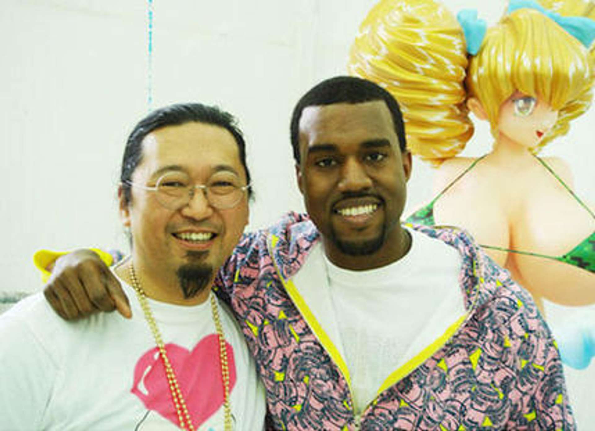 A photograph of artist Takashi Murakami and rapper Kanye West standing in front of Hiropon.
