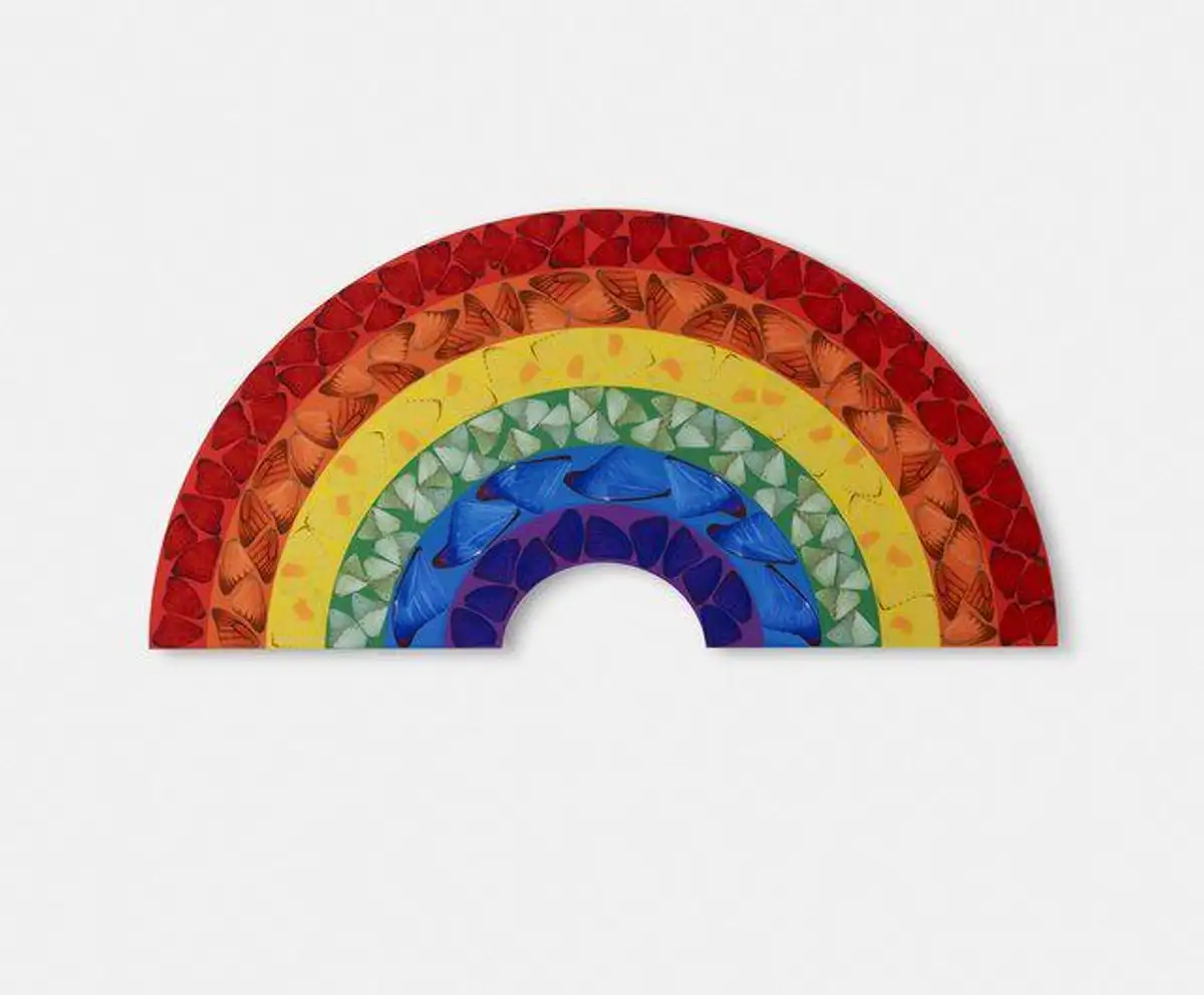 A rainbow against a white background, with colourful butterfly wings in each shade finishing the composition.