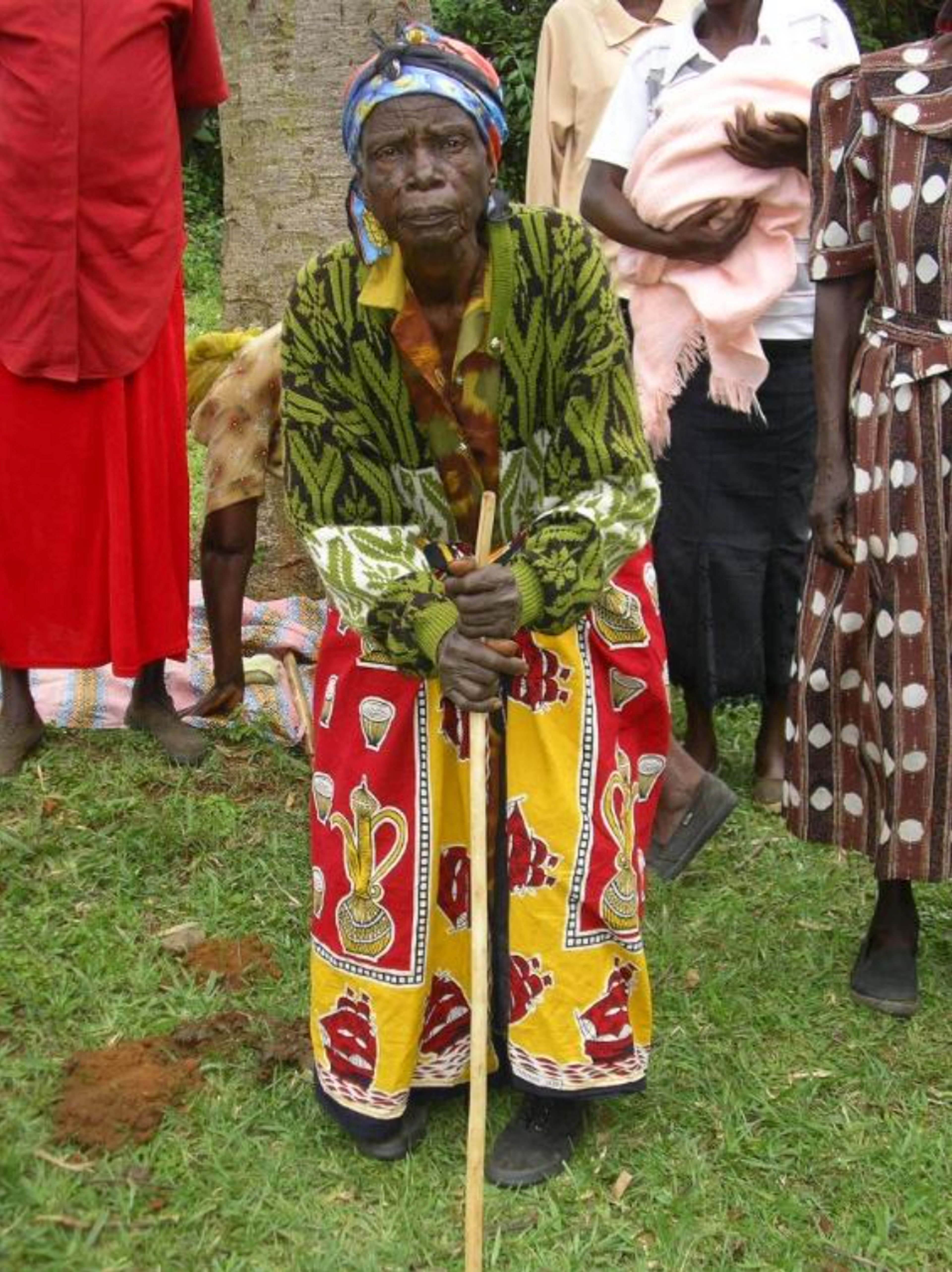 This is Rosea. She lives in a traditional house with her 4 grandchildren. She is the only adult left for these young kids…  she is supported by the other Widows in her group: an amazing lady.