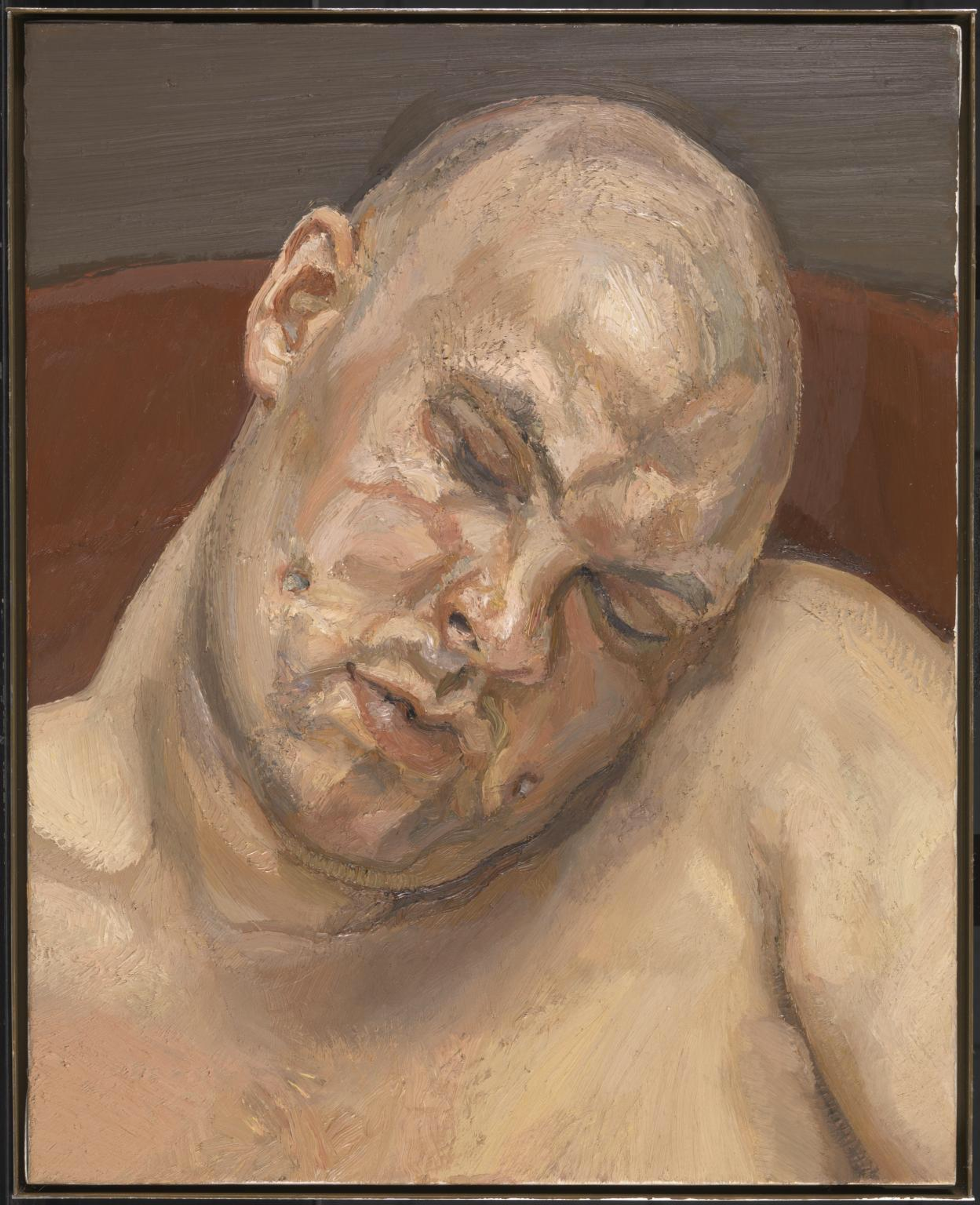 An image of the work Leigh Bowery by Lucian Freud. It shows a bald shirtless man who appears to be sleeping. The colour palette is muted and naturalistic.