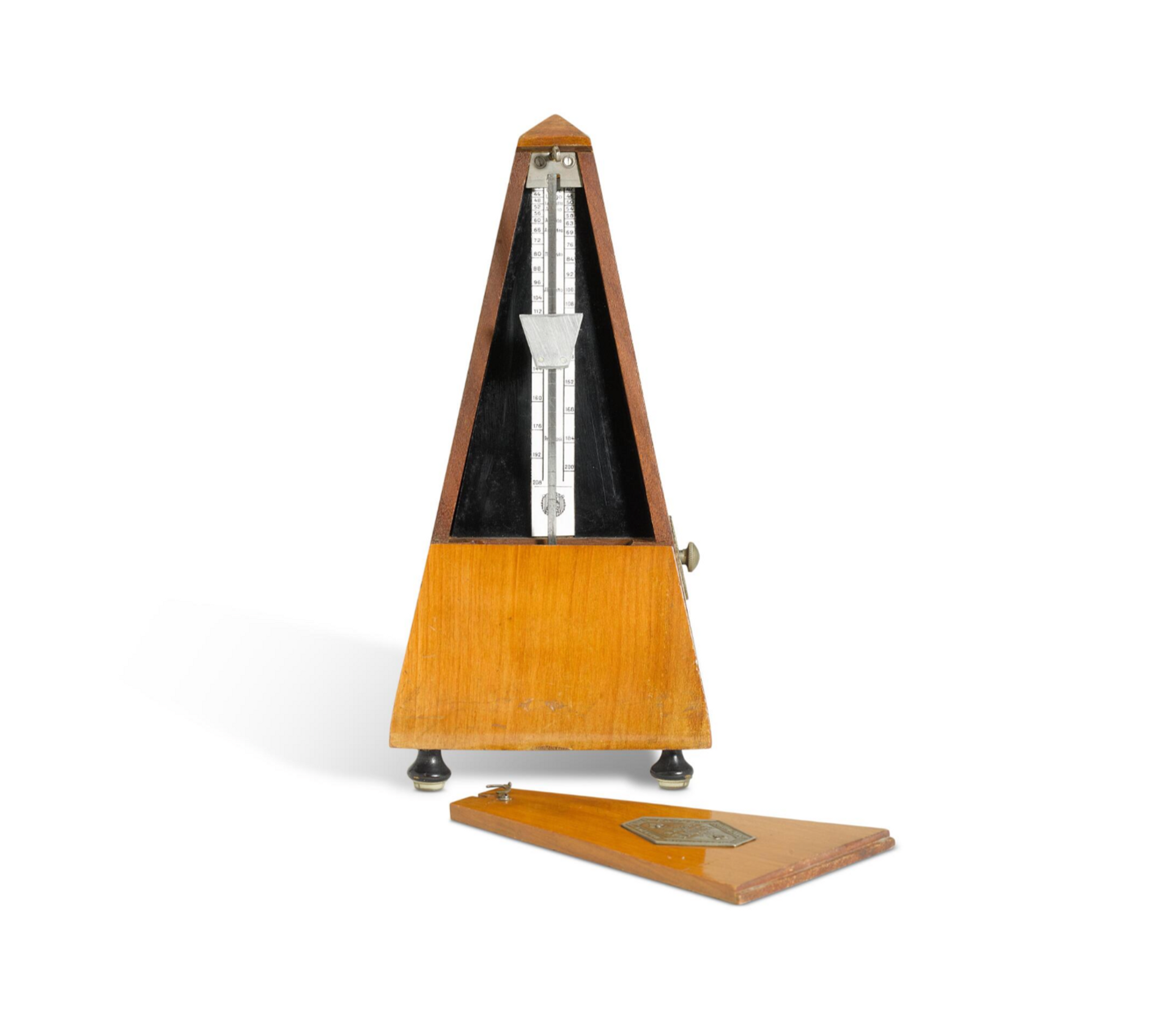 A walnut metronome, owned by Freddie Mercury.