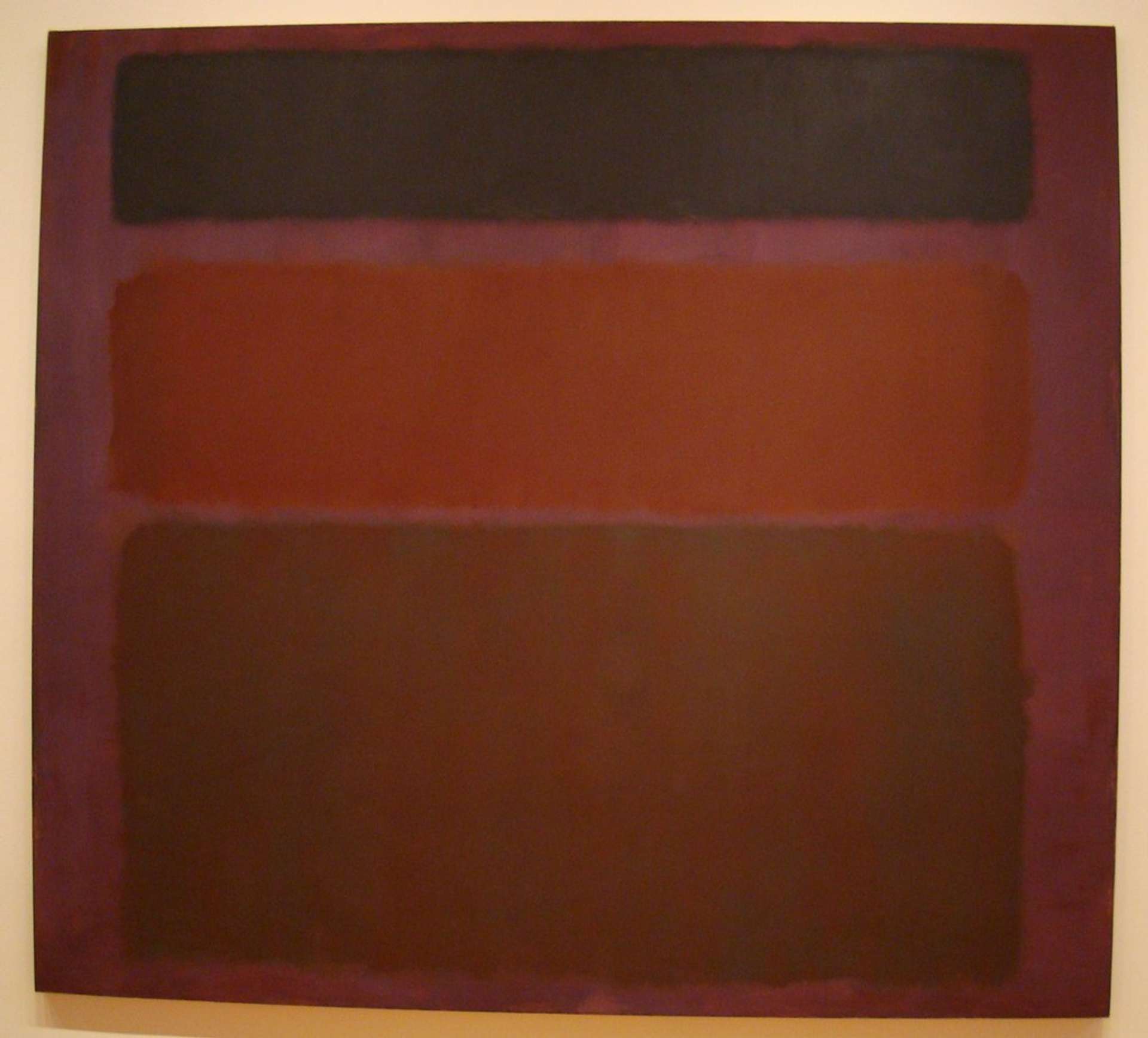 An abstract painting titled "No. 16 (Red, Brown, and Black)" featuring three blocks of colour - red, brown, and black - blending into one another on a large, rectangular canvas.