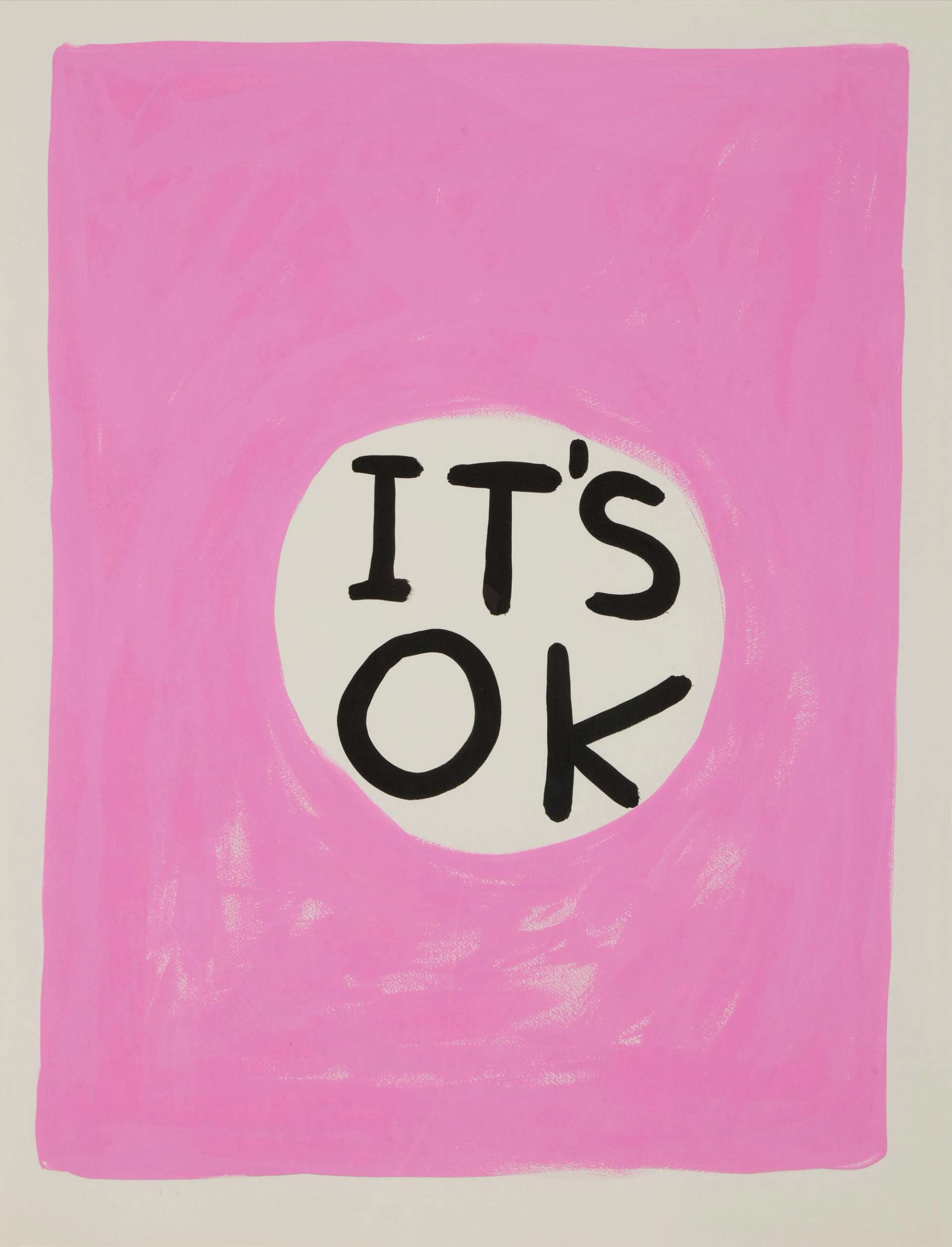 A print of David Shrigley’s Untitled (It’s Ok). A white-bordered pink painting with the phrase “it’s ok” in the middle of the painting, inside of a solid white circle.