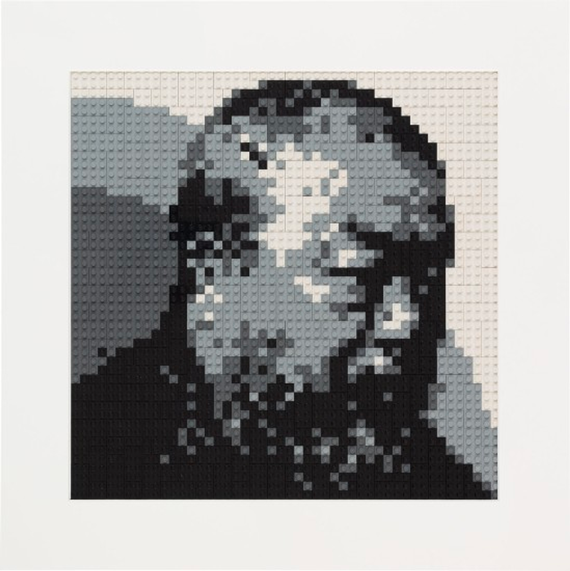 A portrait of artist Ai Weiwei from a side profile, made out of lego