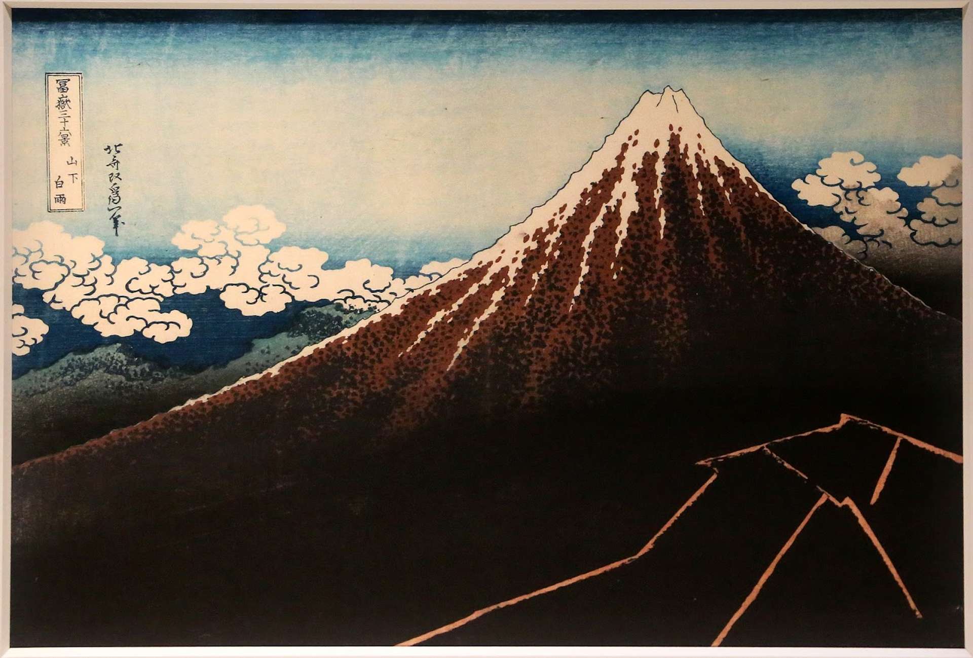 Japanese style mountain rising above the clouds