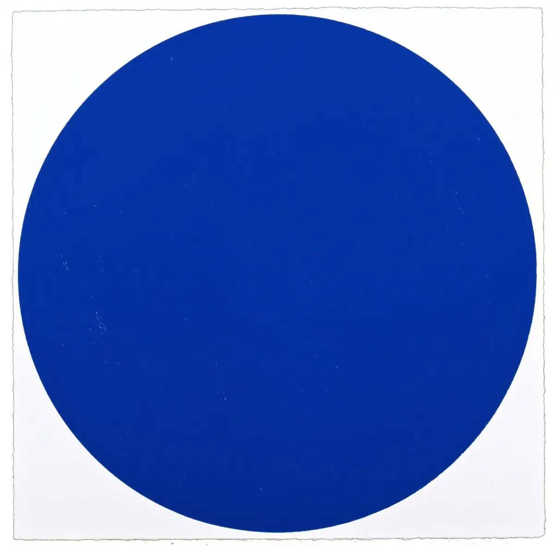 The print shows a perfect circle in blue, positioned in the centre of the square composition, set against a plain white backdrop.