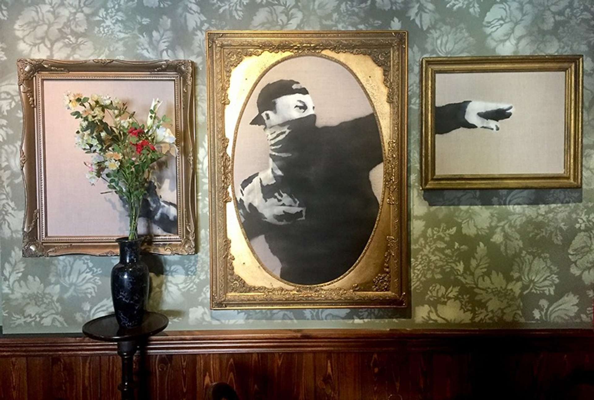 Walled Off Hotel Lobby by Banksy
