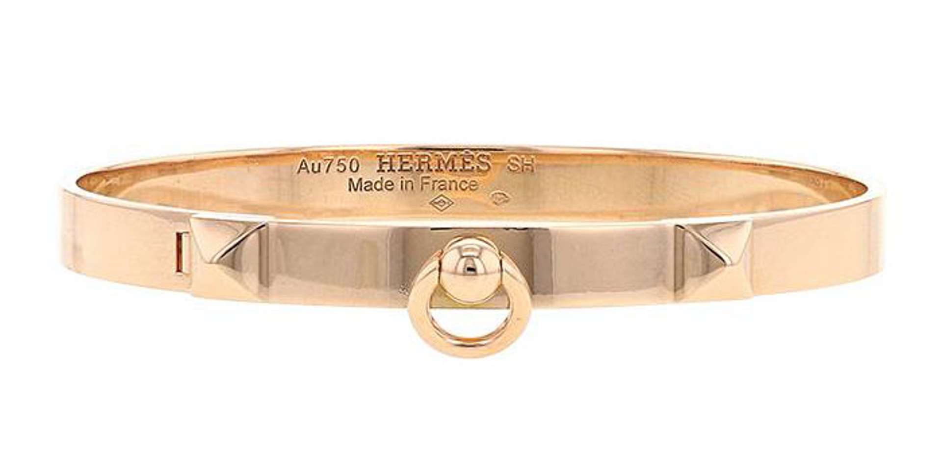 An image of a rose gold version of Hermès’ Collier de Chien bracelet.