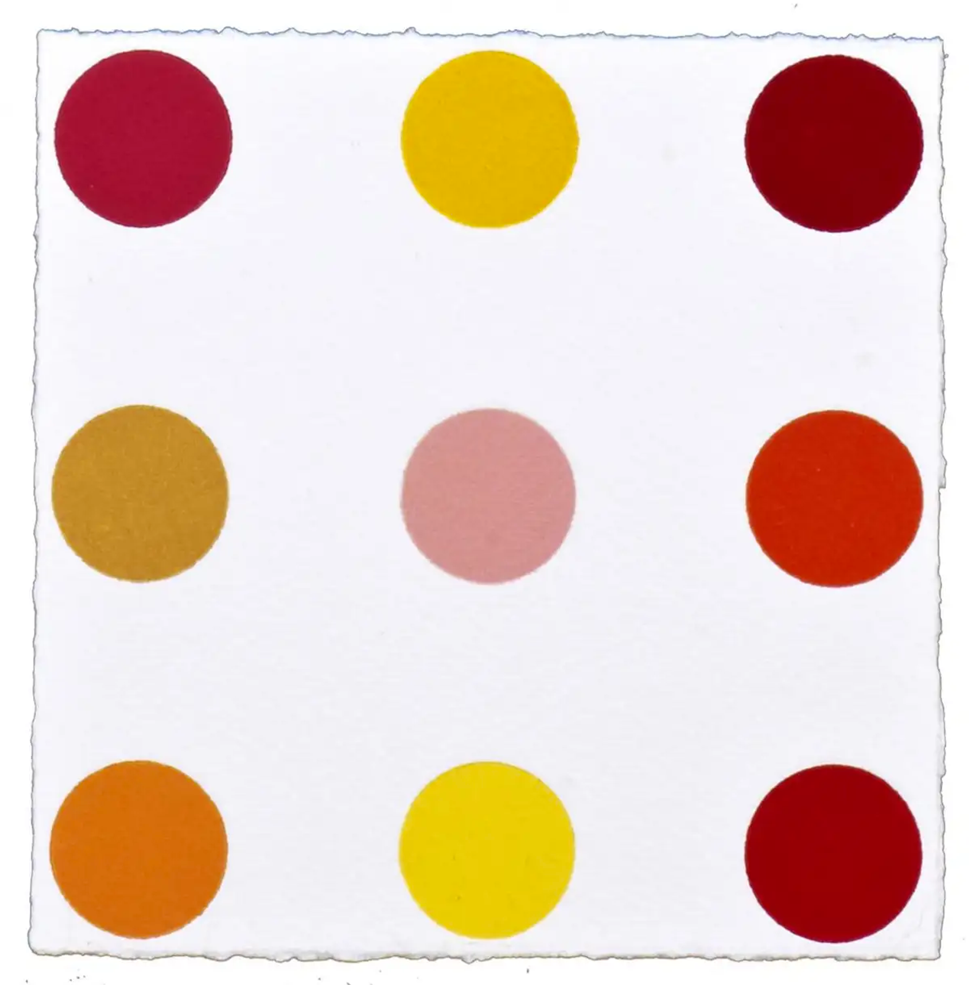 The print shows various coloured spots arranged methodically into four rows of three. Each spot is a different hue, in a warm colour palette.