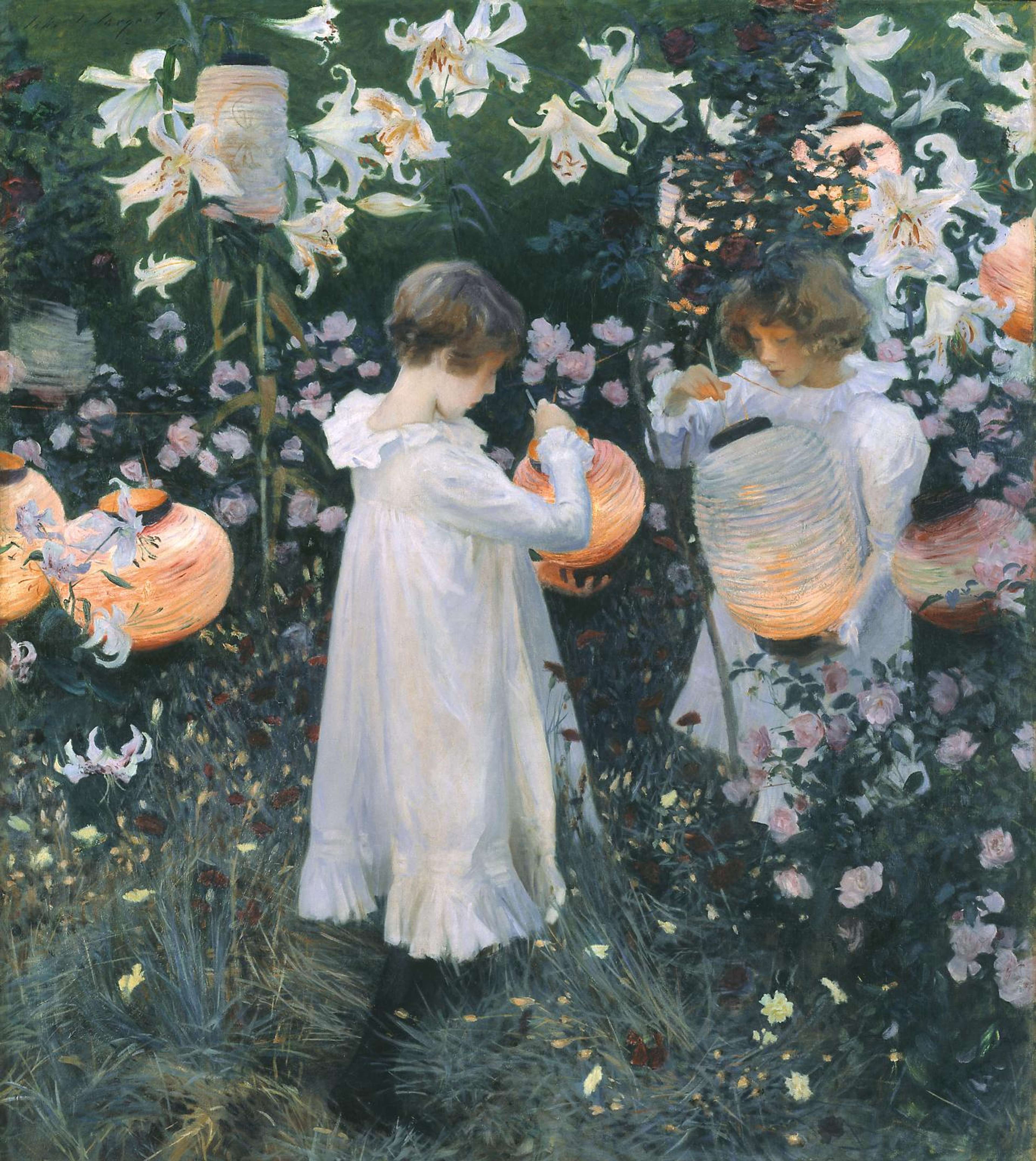 Two young girls in white dresses hold glowing paper lanterns among tall lilies and roses in a dusky garden, their faces softly lit by the warm lantern light.