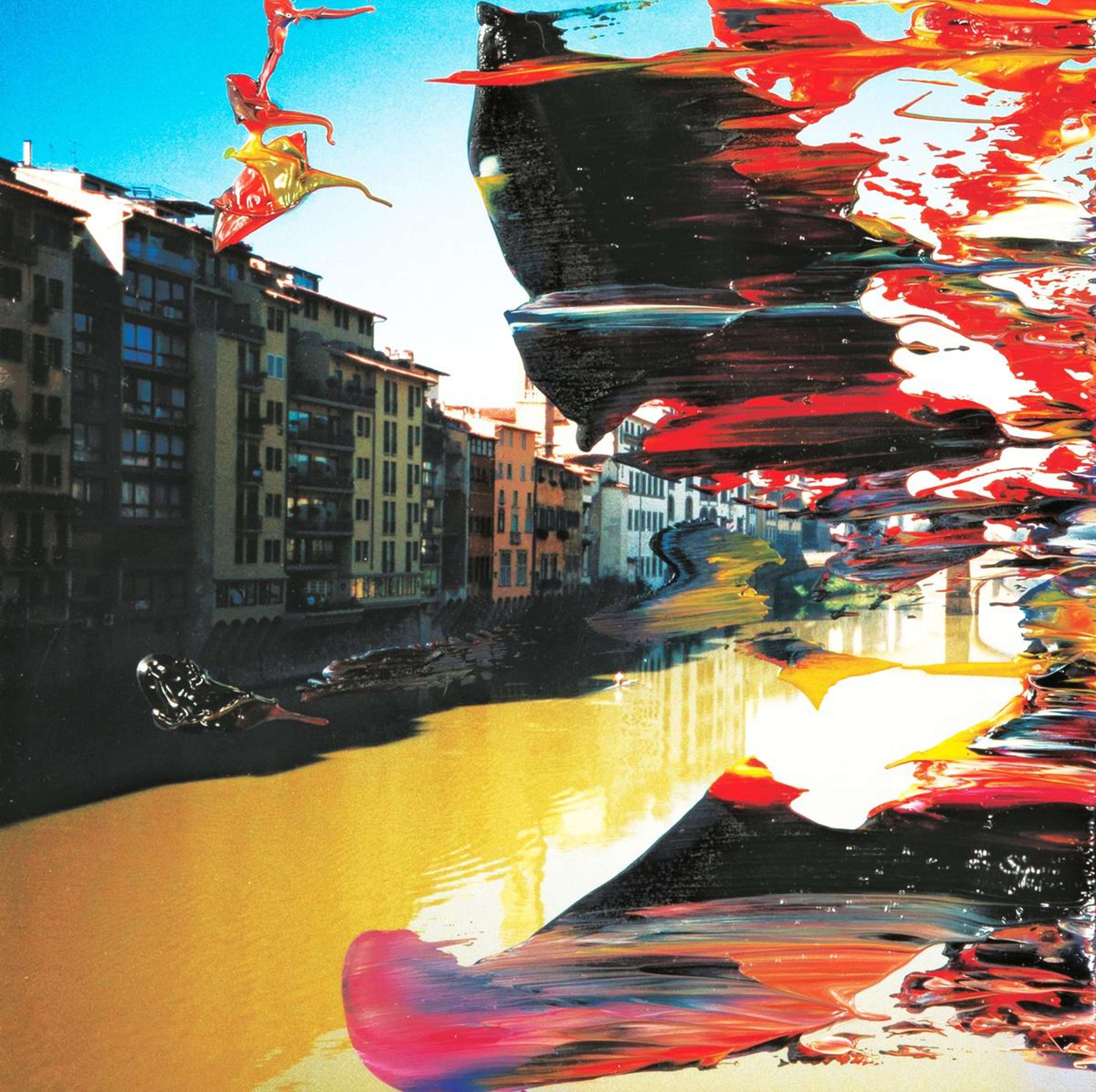 Chromogenic print by Gerhard Richter of the Arno River. The water is a mustard yellow colour, the buildings alongside the river are muted earthy tones and they stand under a bright blue sky. On the right hand side of the picture plane, oil paint in pink, red, orange, blue and black are smeared across the print, with the paint's colours merging together.