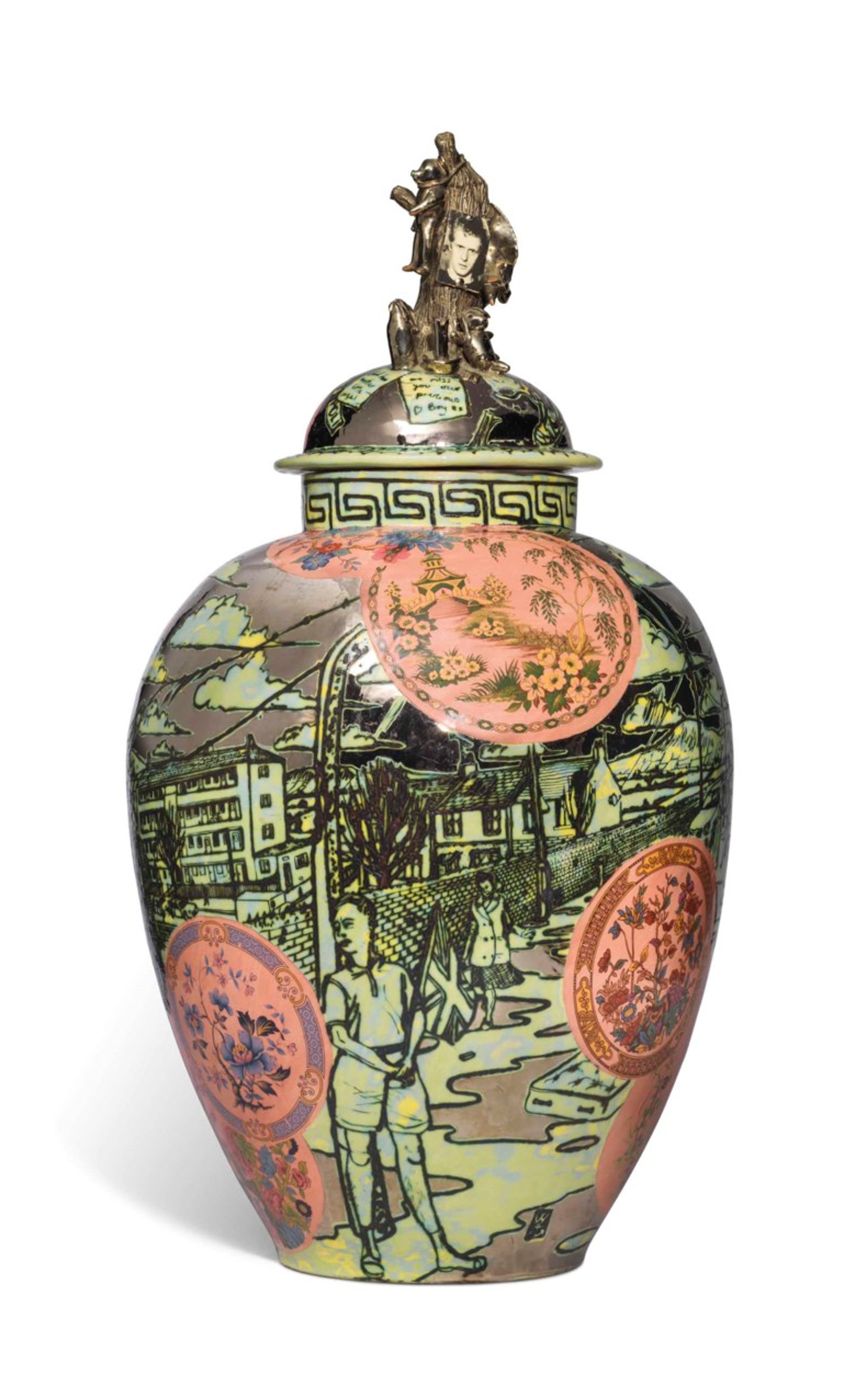 Ceramic vase by Grayson Perry, featuring a vivid portrayal of class and consumerism through a northern working-class town setting. Perry's work intricately incorporates personal elements, such as a memorial to his alter-ego Alan Measles