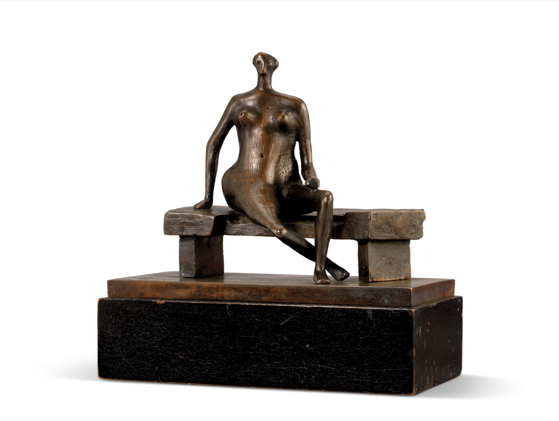 A seated woman sculpture with a loosely abstracted figural form. Her legs are crossed, and her breasts are accentuated as she sits on a bench placed on a rectangular plinth.