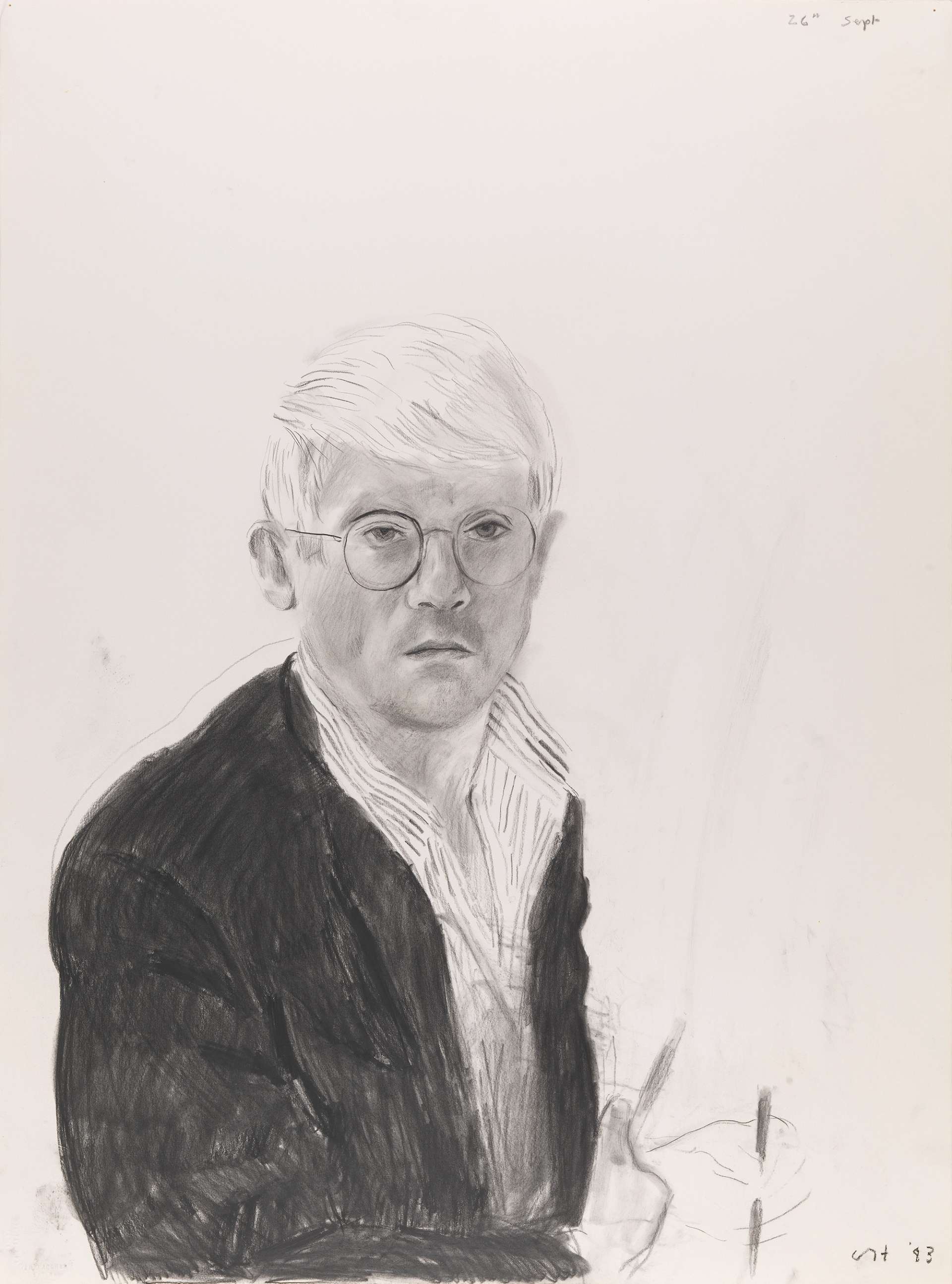 A monochromatic, charcoal self-portrait by David Hockney. The artist depicts himself in the lower left of the composition, wearing a dark jacket to contrast his light hair, wearing glasses and looking past the viewer.