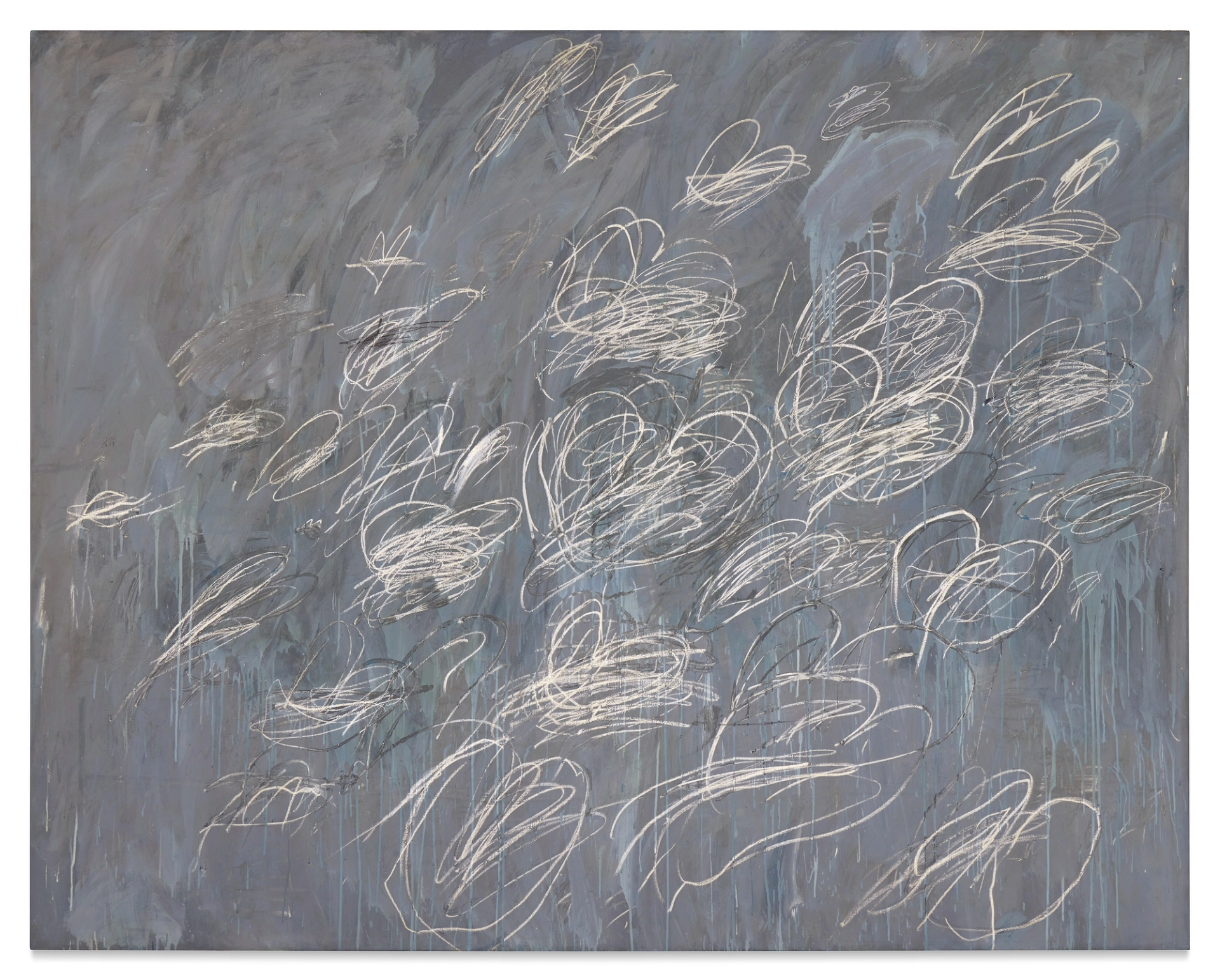 This Untitled work by Cy Twombly shows clusters of round white scribbles against a grey background.