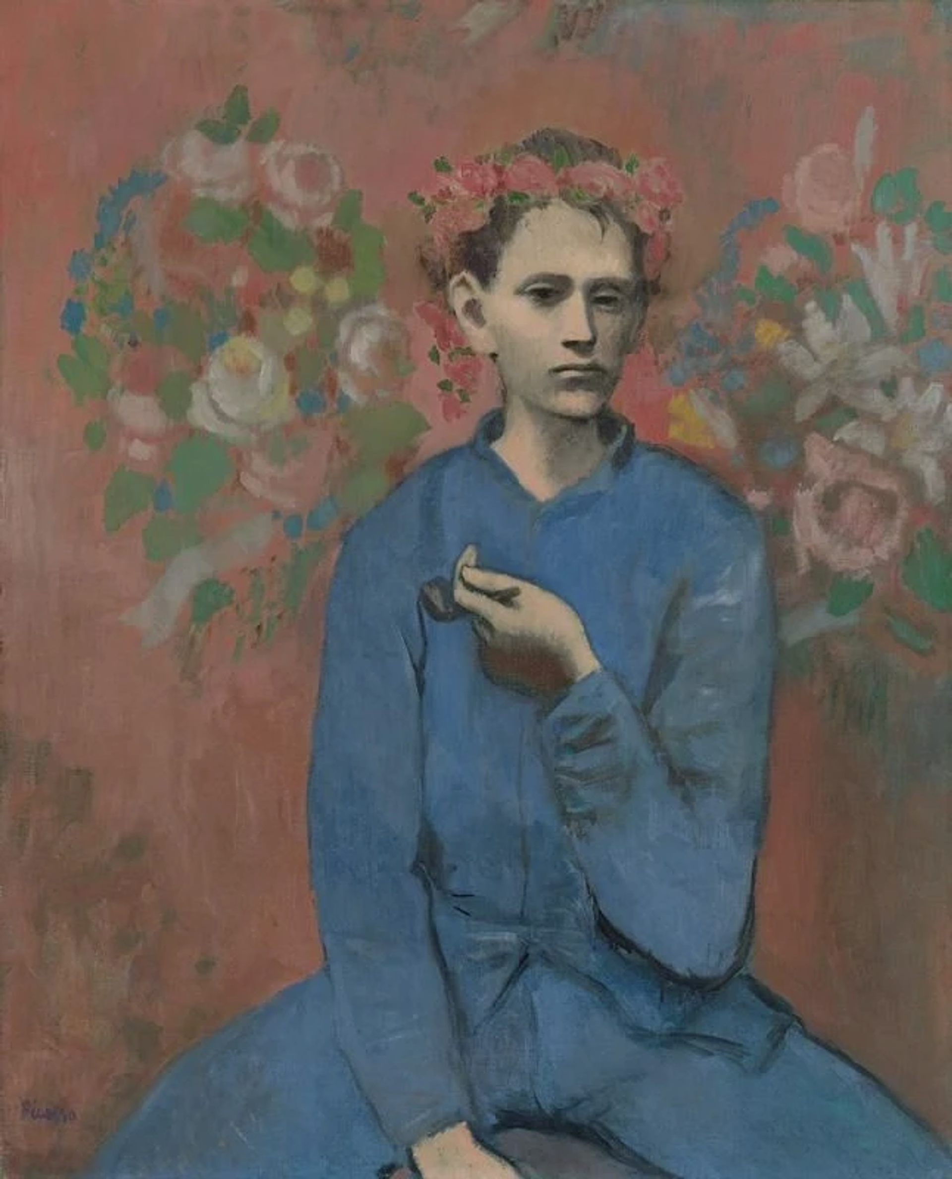 Painting by Pablo Picasso depicting an adolescent boy who holds a pipe in his left hand and wears a garland of flowers on his head. In the background two floral wall murals are positioned behind the figure to resemble wings.