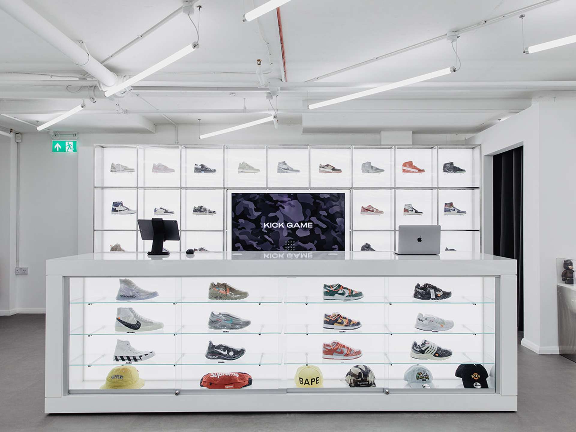 An image of one of KickGame’s sneaker stores, showing all shoes against a white background.