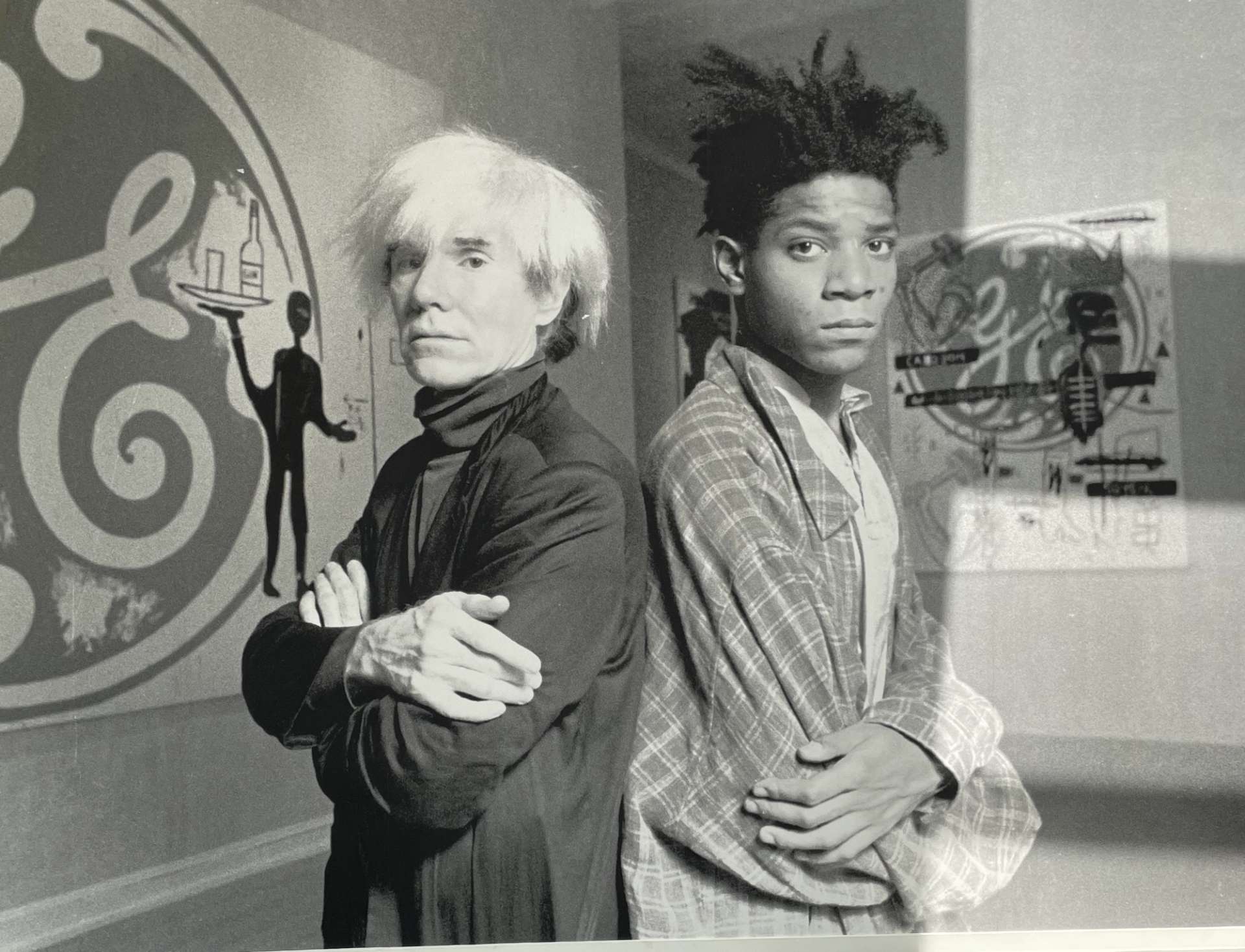 Black and white picture of Andy Warhol and Jean-Michele Basquiat