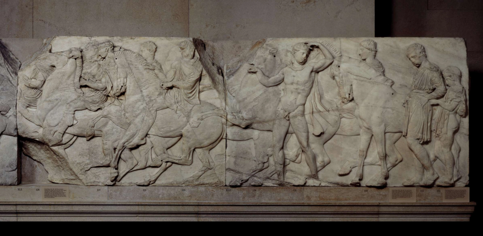 An image of a frieze from the Parthenon marbles. The frieze shows the procession of the Panathenaic festival, the commemoration of the birthday of the goddess Athena.