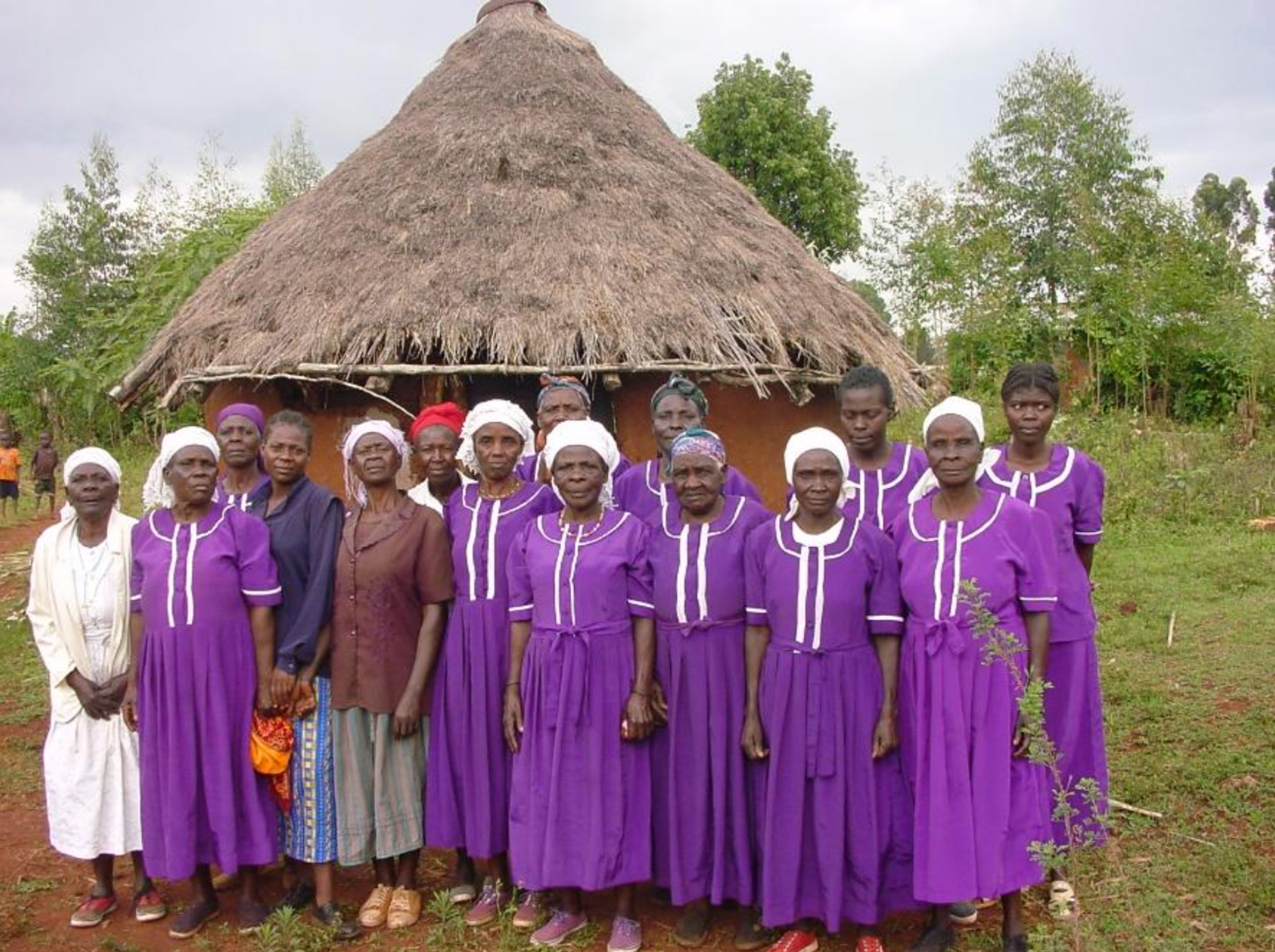 One of our groups of Widows. There are 15 Widows in this group and in total they have over 100 grandchildren they look after.  They have a ‘Table Bank’ to use as their own private bank; they take loans from this to help maintain their loves, start small income generation projects and feed their grandchildren. Each Widow has a cow which provides income from calves and milk. WORK also bought them an acre of land which they farm as a Co-operative. They are completely sustainable now.