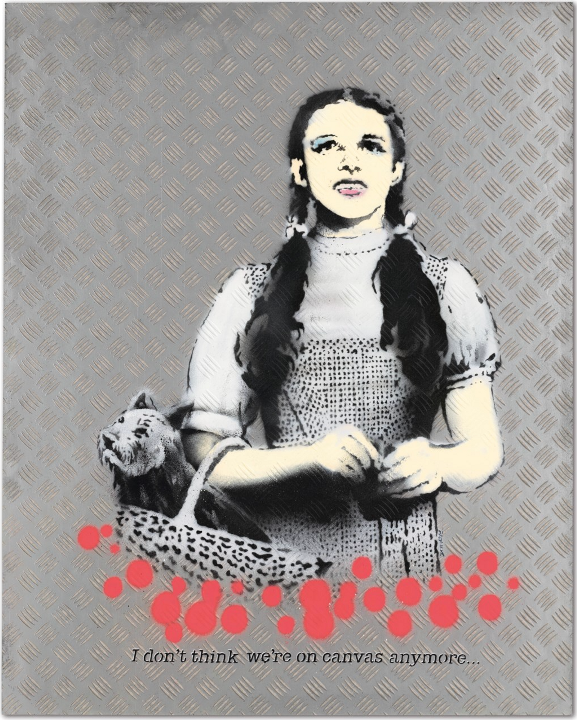 A spray paint on lino flooring laid on board work by Banksy, depicting Dorothy from the Wizard of Oz carrying her dog - Toto - in a basket. Underneath this focal point are sprays of red paint, and the words: “I don't think we're on canvas anymore...”