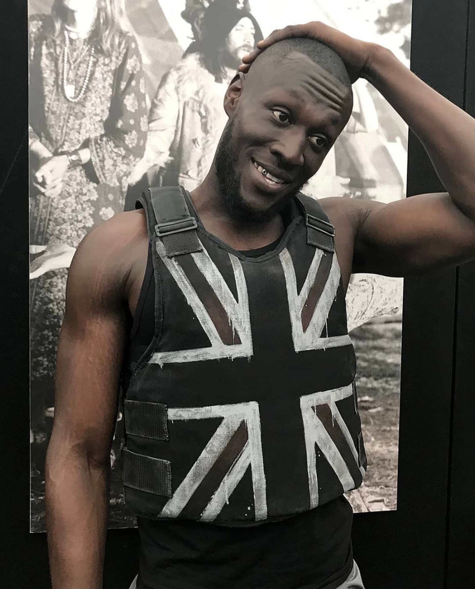 Stormzy at Glastonbury in his ‘customised’ stab-proof vest made by Banksy