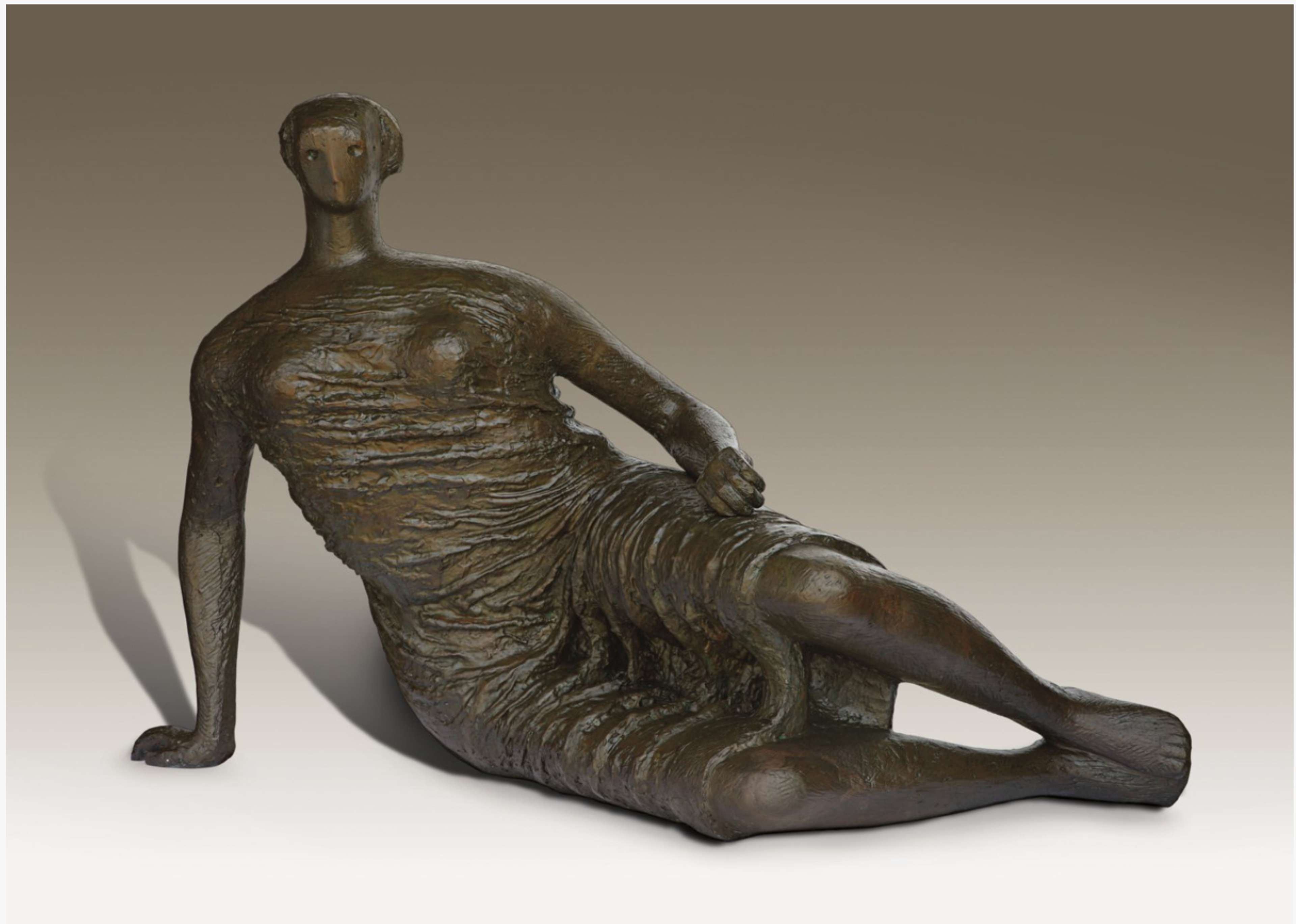 A sculpture by Henry Moore featuring a seated woman. The woman is depicted resting on the side of her thigh, with one arm on her hip and the other supporting her weight by being planted in the ground. The sculpture highlights prominent protruding breasts and showcases a crinkled drapery that resembles a dress, enveloping the body.