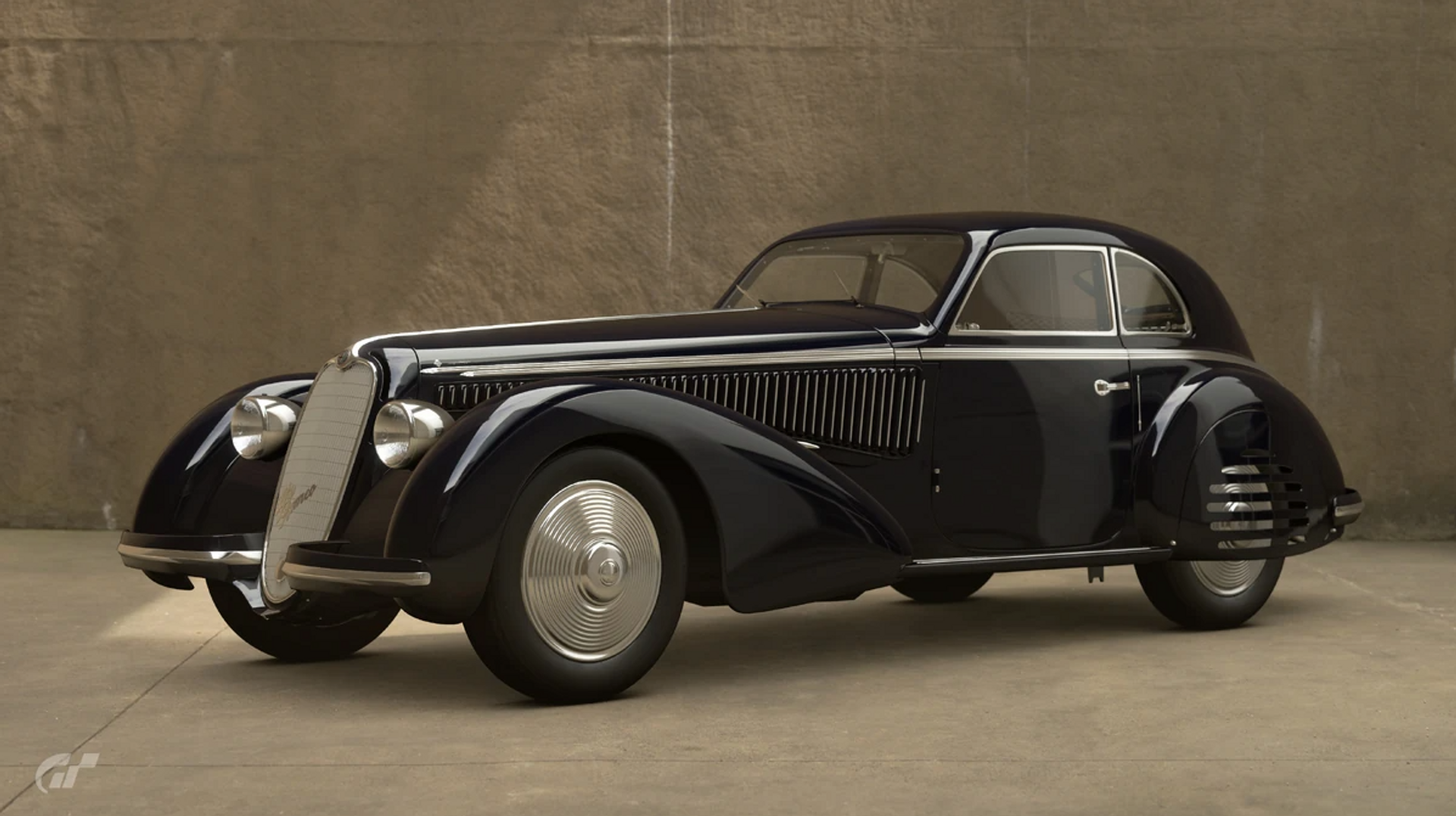 1939 ALFA ROMEO 8C 2900B TOURING BERLINETTA. The black car has a prolonged bonnet, and is pictured against a concrete background