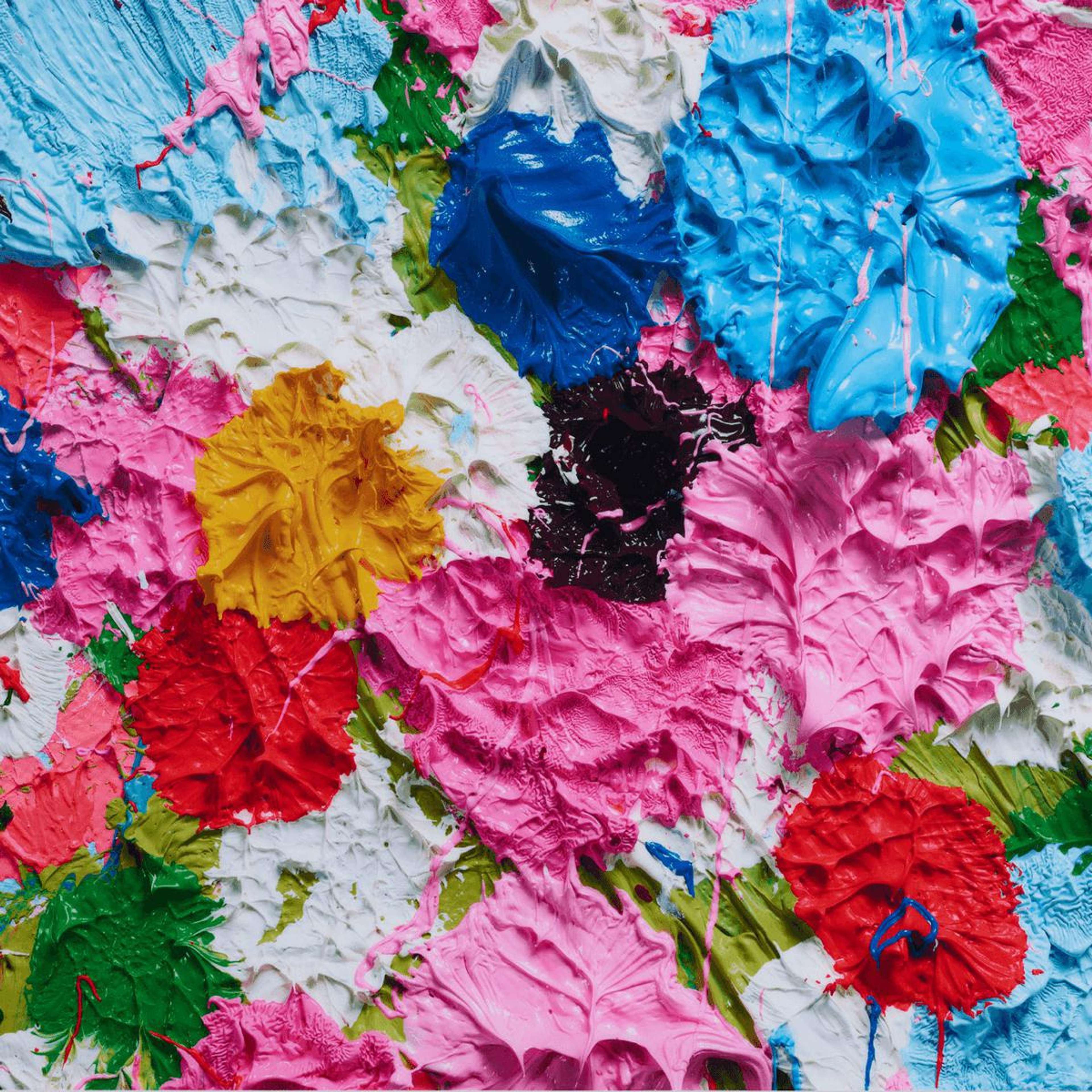 This print depicts a close-up image of a canvas covered in thick layers of paint. The colourful dabs of paint make up a small section of a larger canvas which invites the viewer to ponder what lies beyond the frame of the composition. 