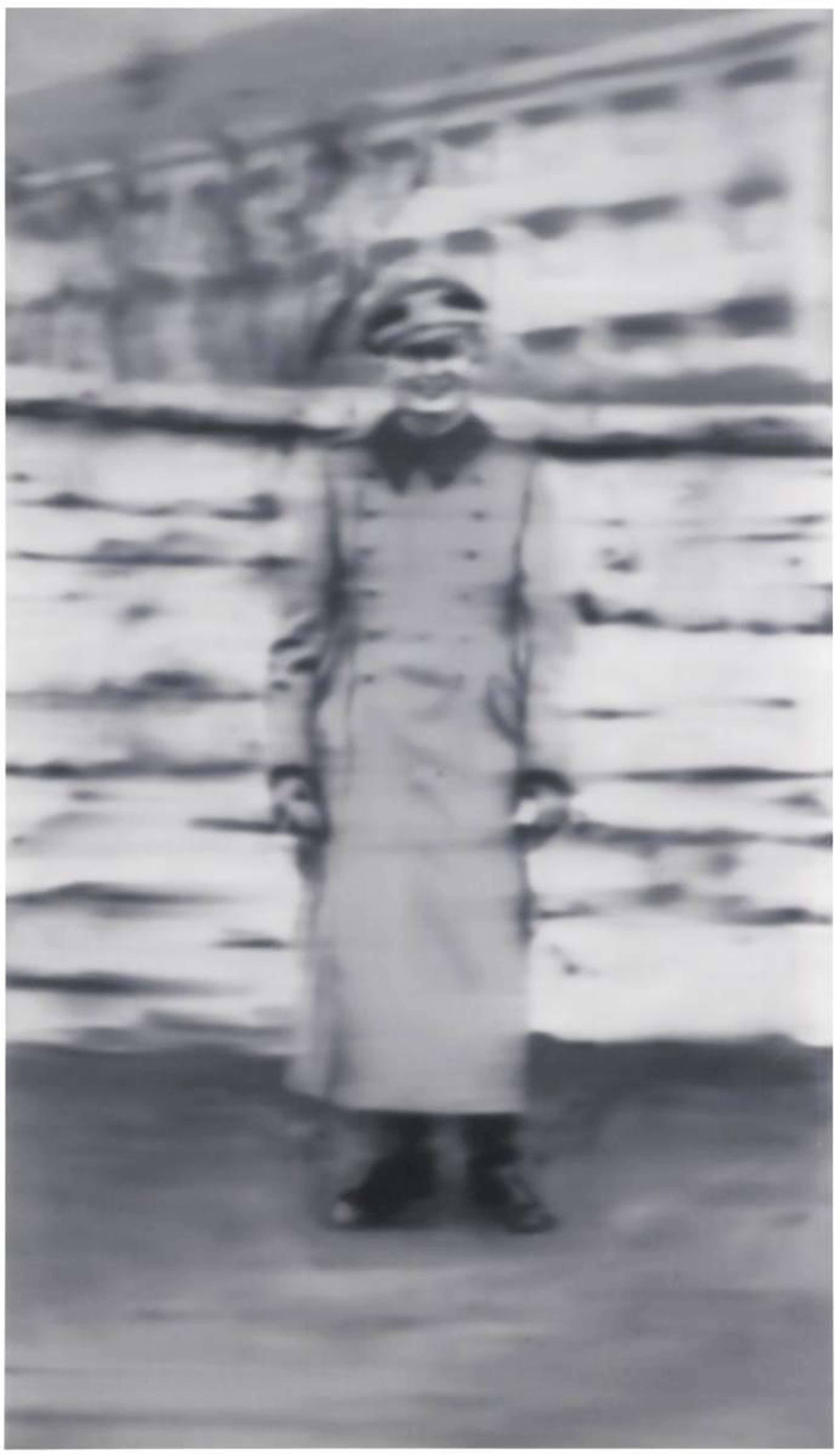 Une image floue, semblable à une photographie, d'un soldat en uniforme