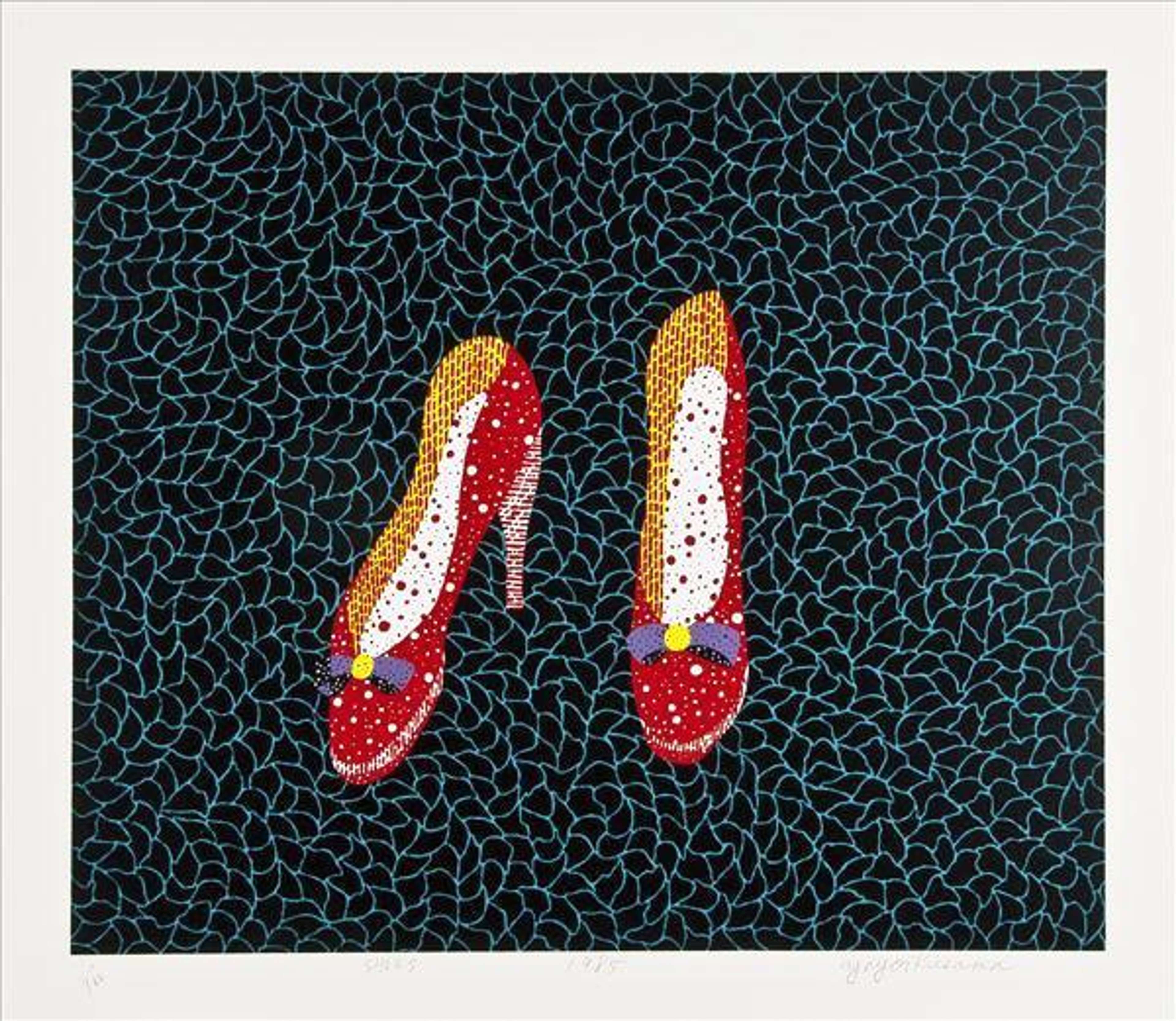 Polka-dotted stilettos presented front and centre, outlined crisply over a mesh-like Infinity Nets backdrop.