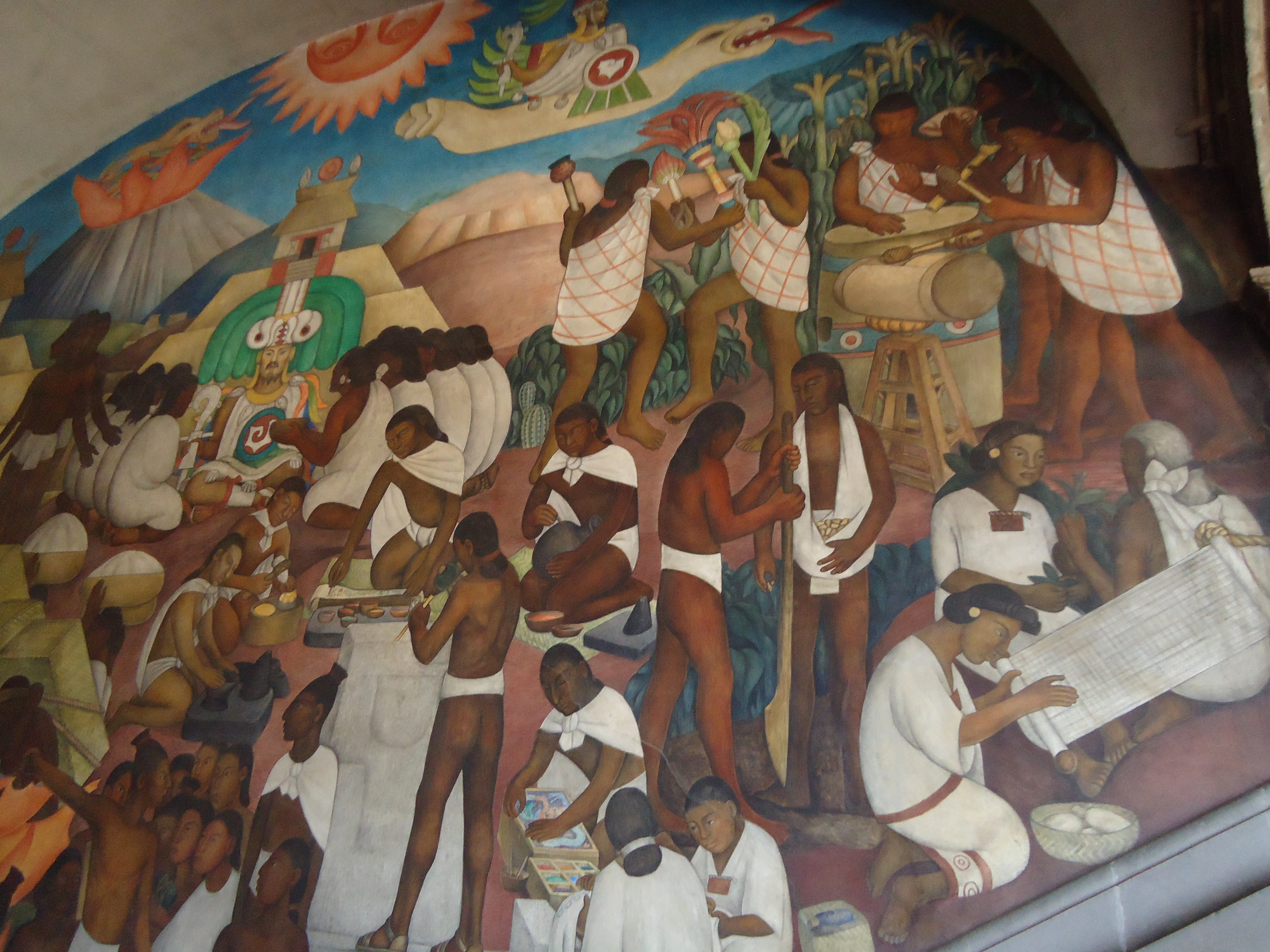 Dans cette murale de Diego Rivera, un groupe d'Amérindiens vêtus de tuniques blanches est représenté rassemblé.