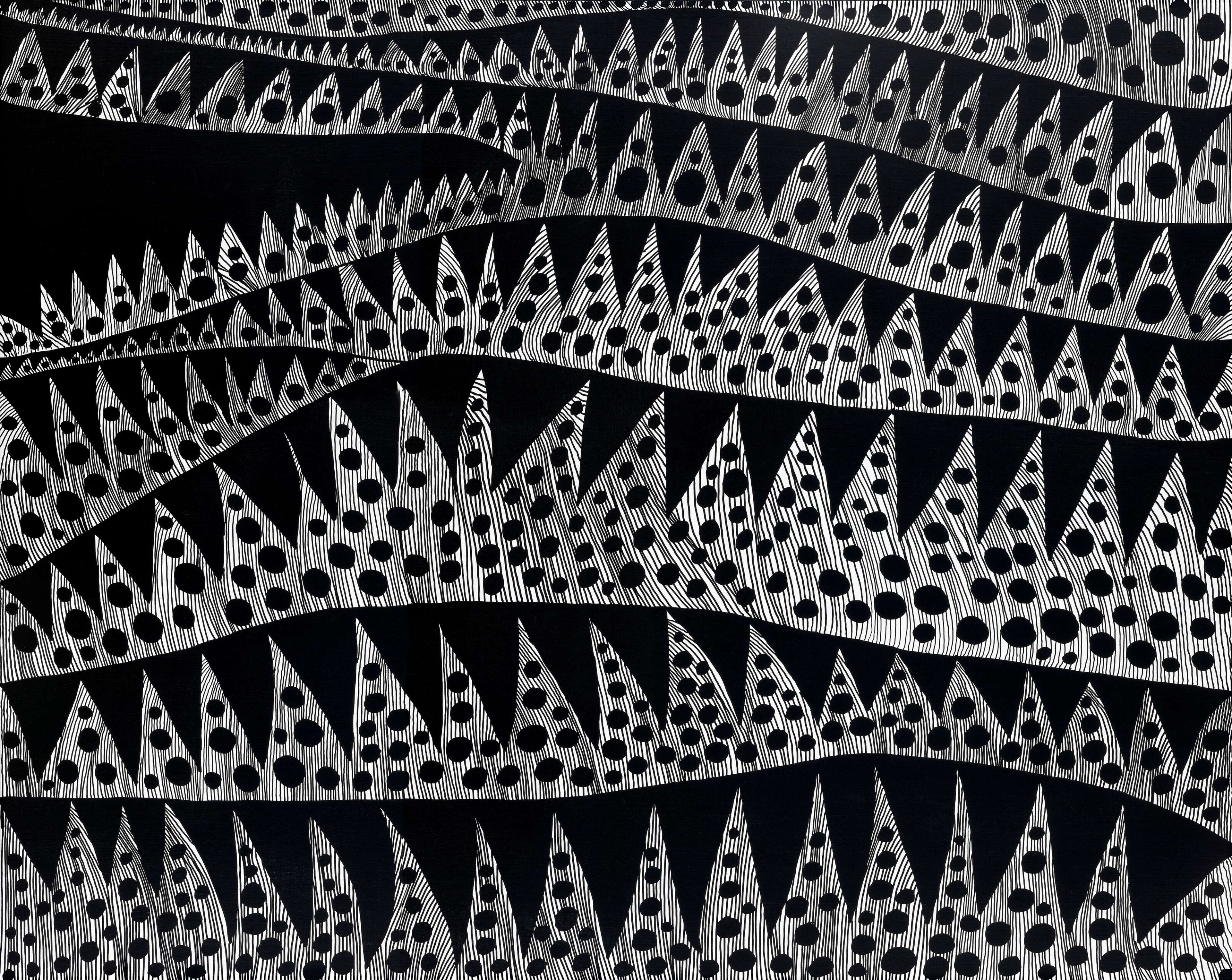 A black and white pattern made of repeated triangles and circles