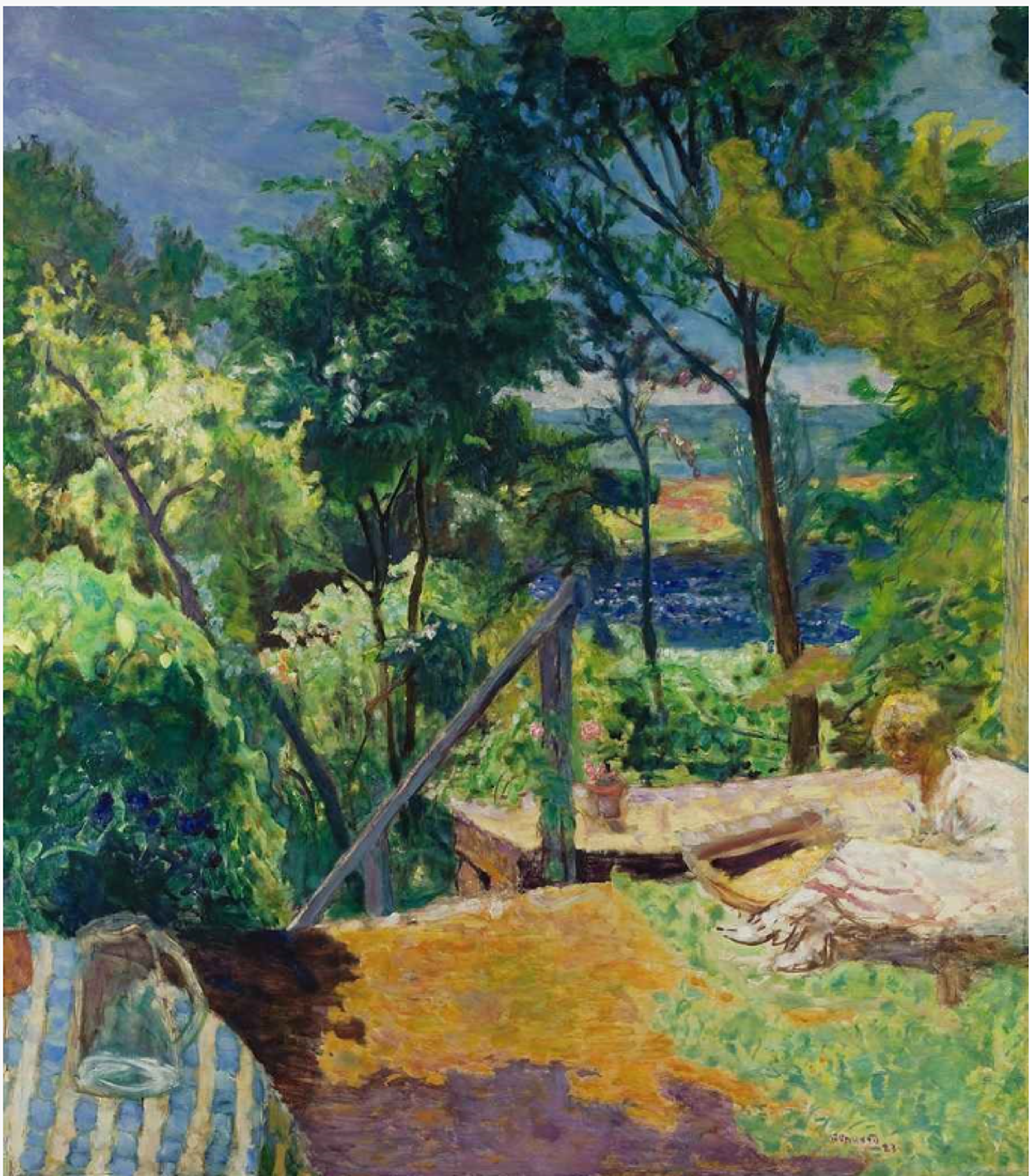 A sunlit garden scene featuring trees and foliage in yellow and green tones. Steps with a banister disappear down into dense, colourful trees. In the lower left corner is a table with a blue and yellow striped tablecloth and a glass jug. A female figure rests on a bench on the right side, with glimpses of water visible through the trees in the distance.