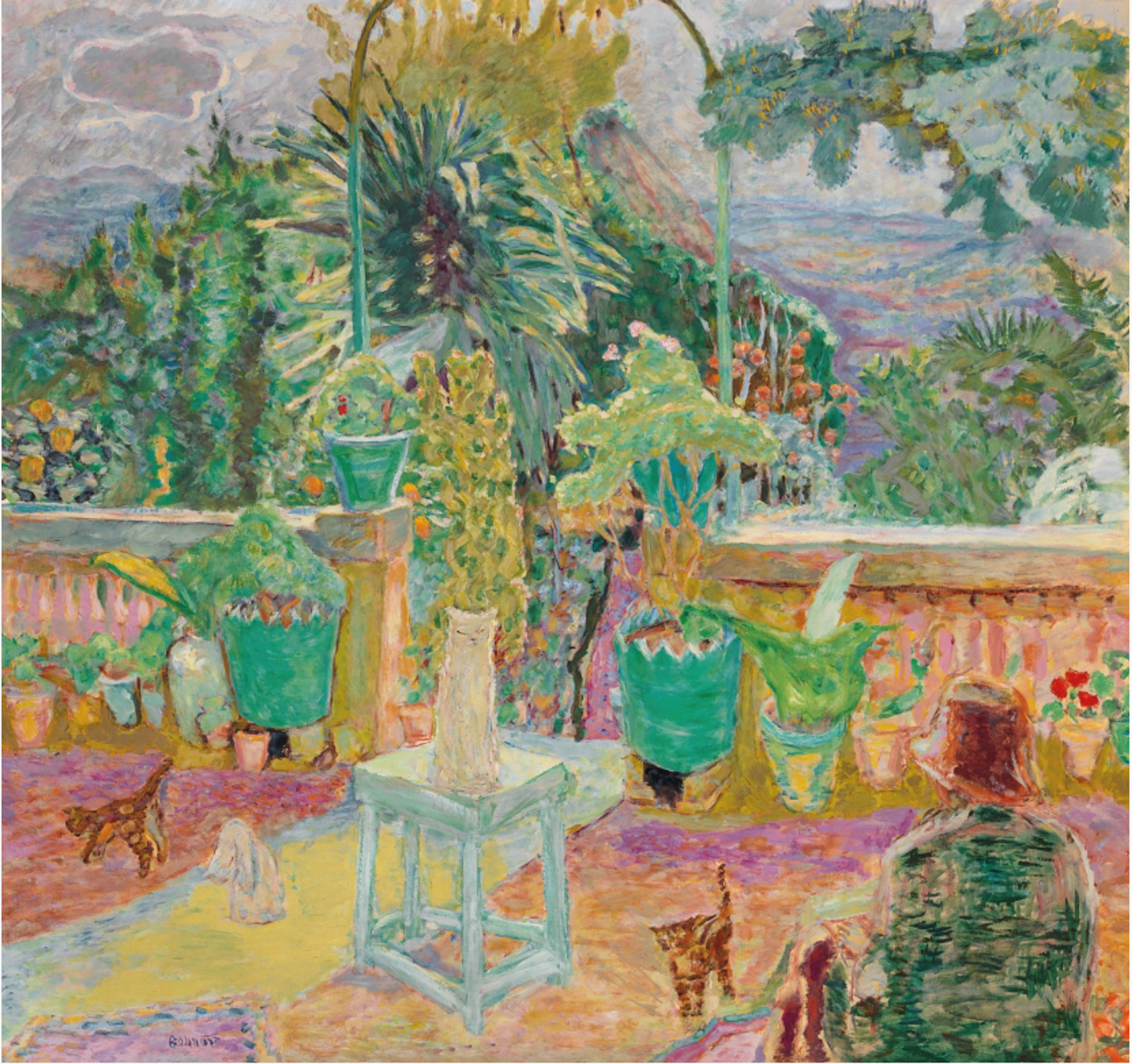 A vibrant terrace garden scene with pink ballustrated walls, lush greenery, and a thin central archway that opens from the terrace onto the landscape beyond. A figure, facing away from the viewer, is seated in the lower right corner. Two cats are also visible among plants and furniture, with the elevated perspective creating a patchwork of vivid colours across the composition.