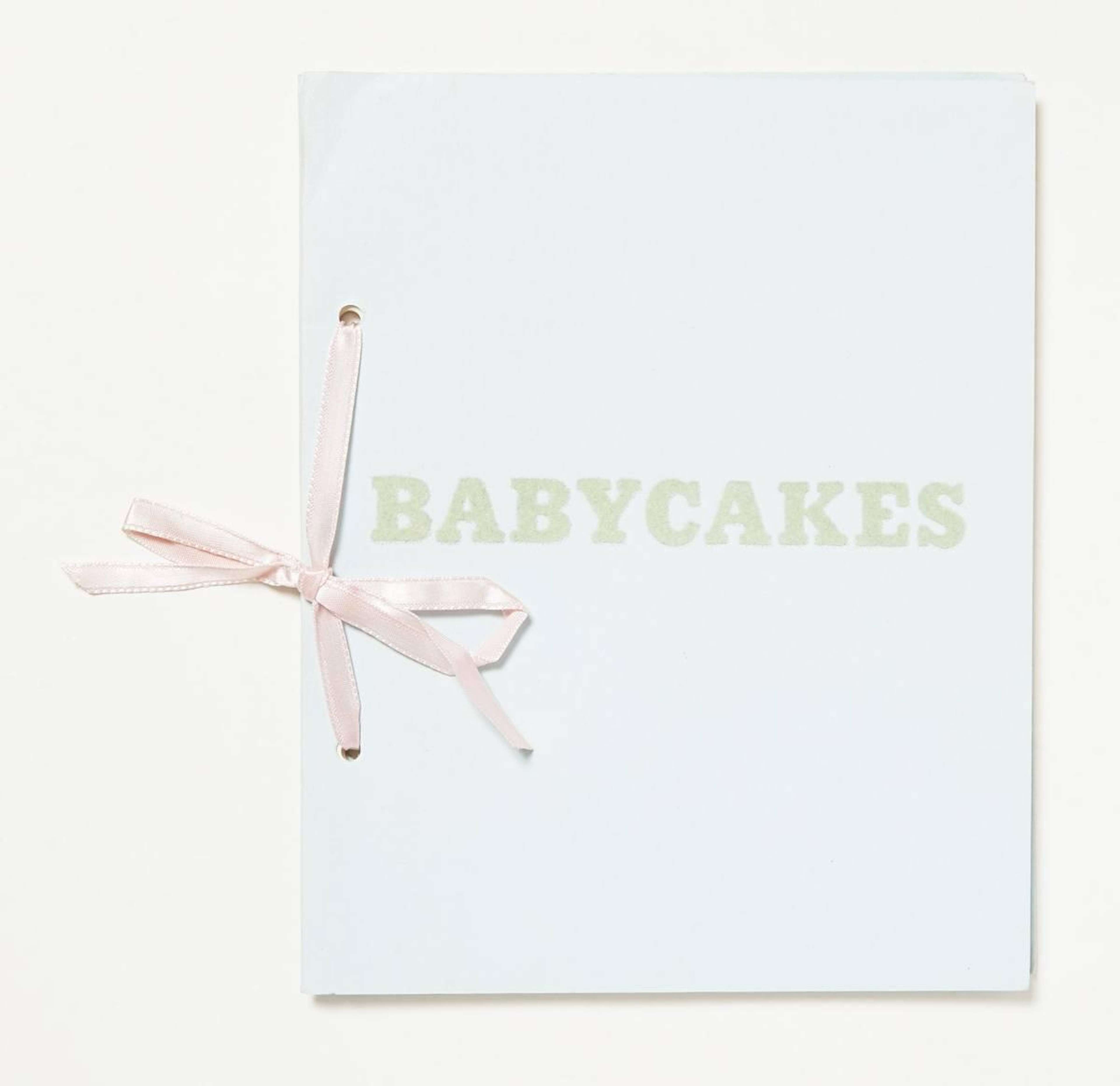 Ed Ruscha's Babycakes (With Weights), a mixed media work featuring “BABYCAKES” next to pink silk bow.